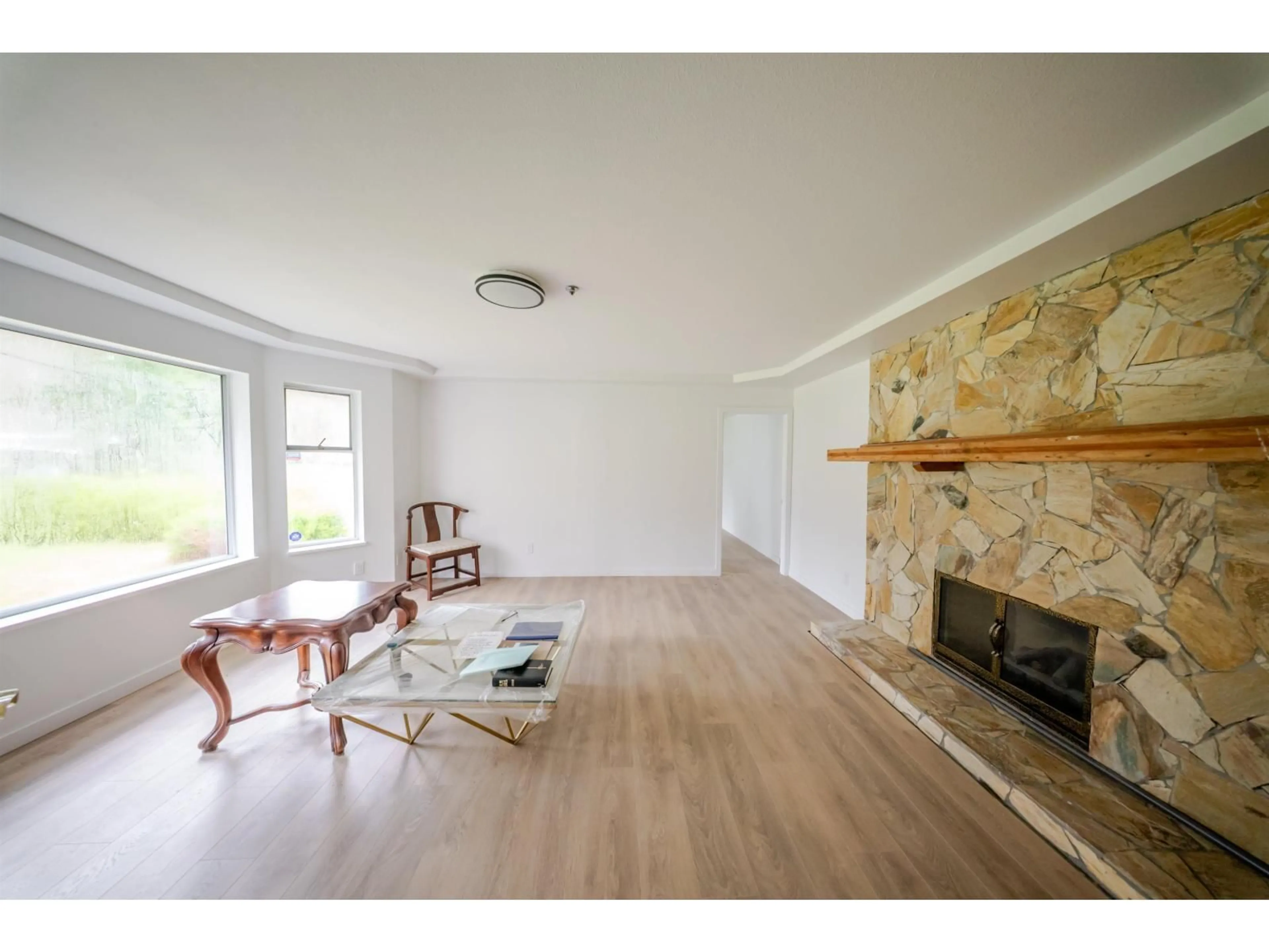 Living room with furniture, wood/laminate floor for 40895 HENDERSON ROAD, Columbia Valley British Columbia V2R4X5