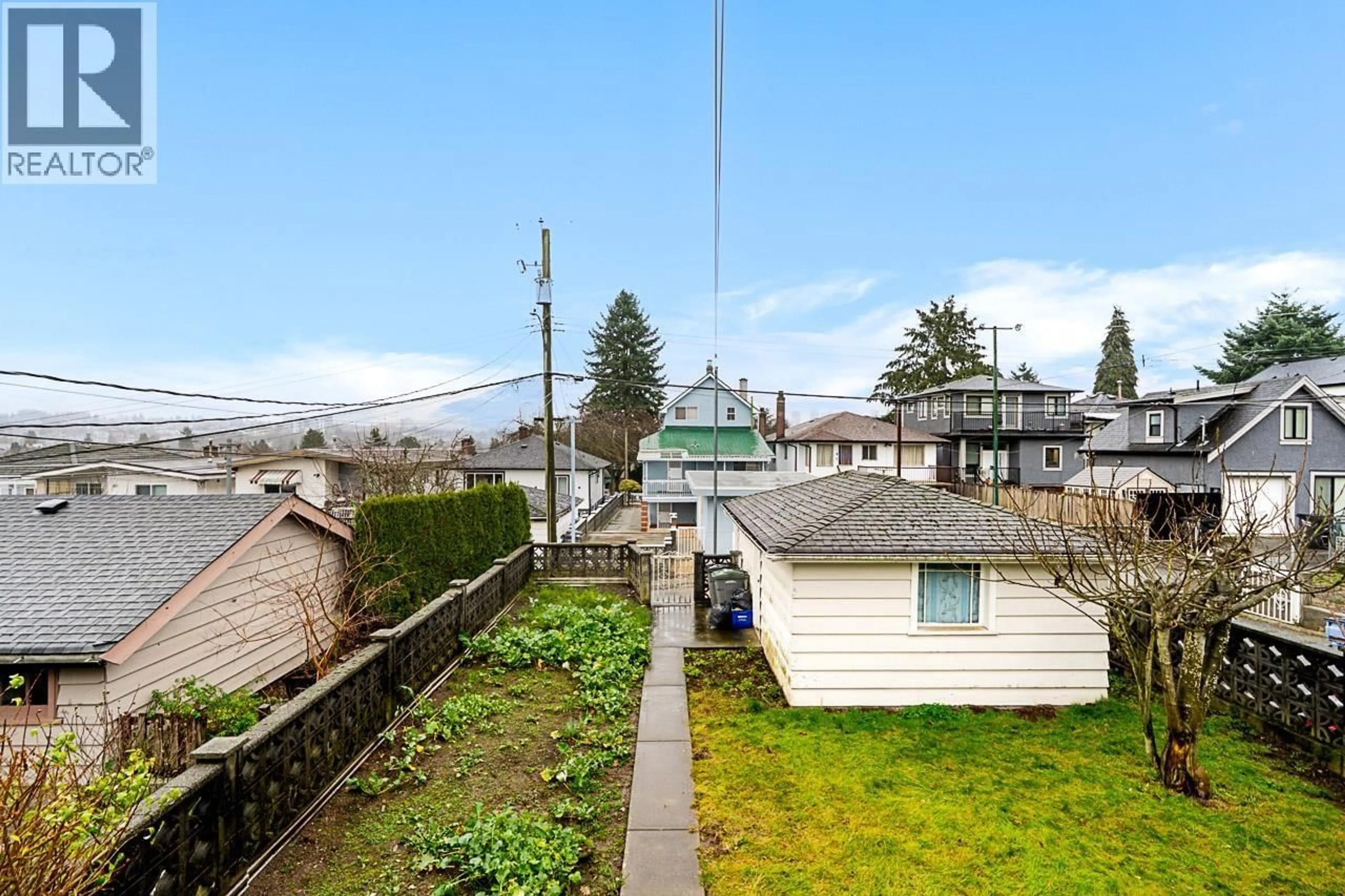 A pic from outside/outdoor area/front of a property/back of a property/a pic from drone, mountain view for 1174 KELOWNA STREET, Vancouver British Columbia V5K4E2