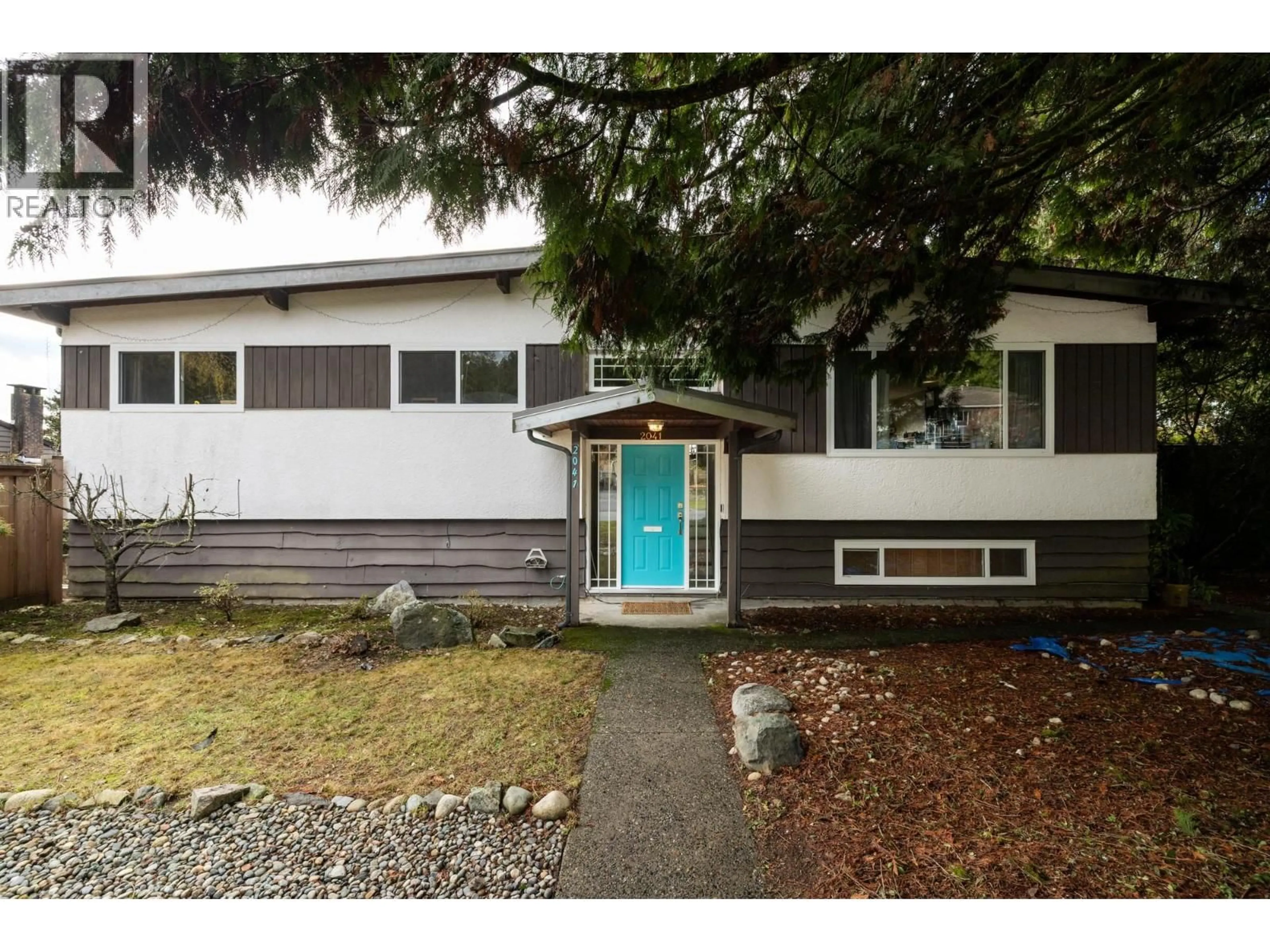 Home with vinyl exterior material, street for 2041 TOMPKINS CRESCENT, North Vancouver British Columbia V7H2C9