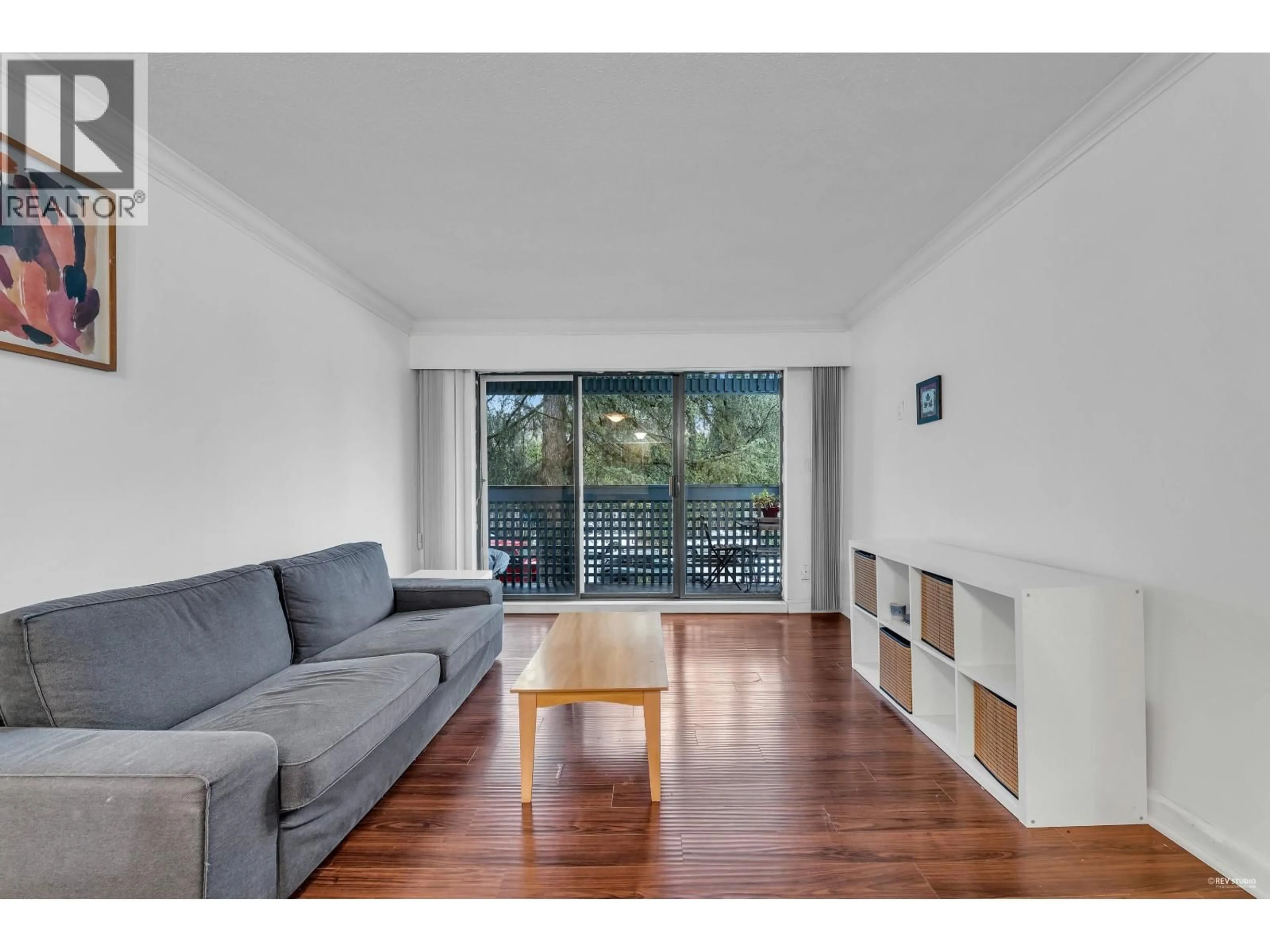 Living room with furniture, wood/laminate floor for 308 - 601 NORTH ROAD, Coquitlam British Columbia V3J1P1