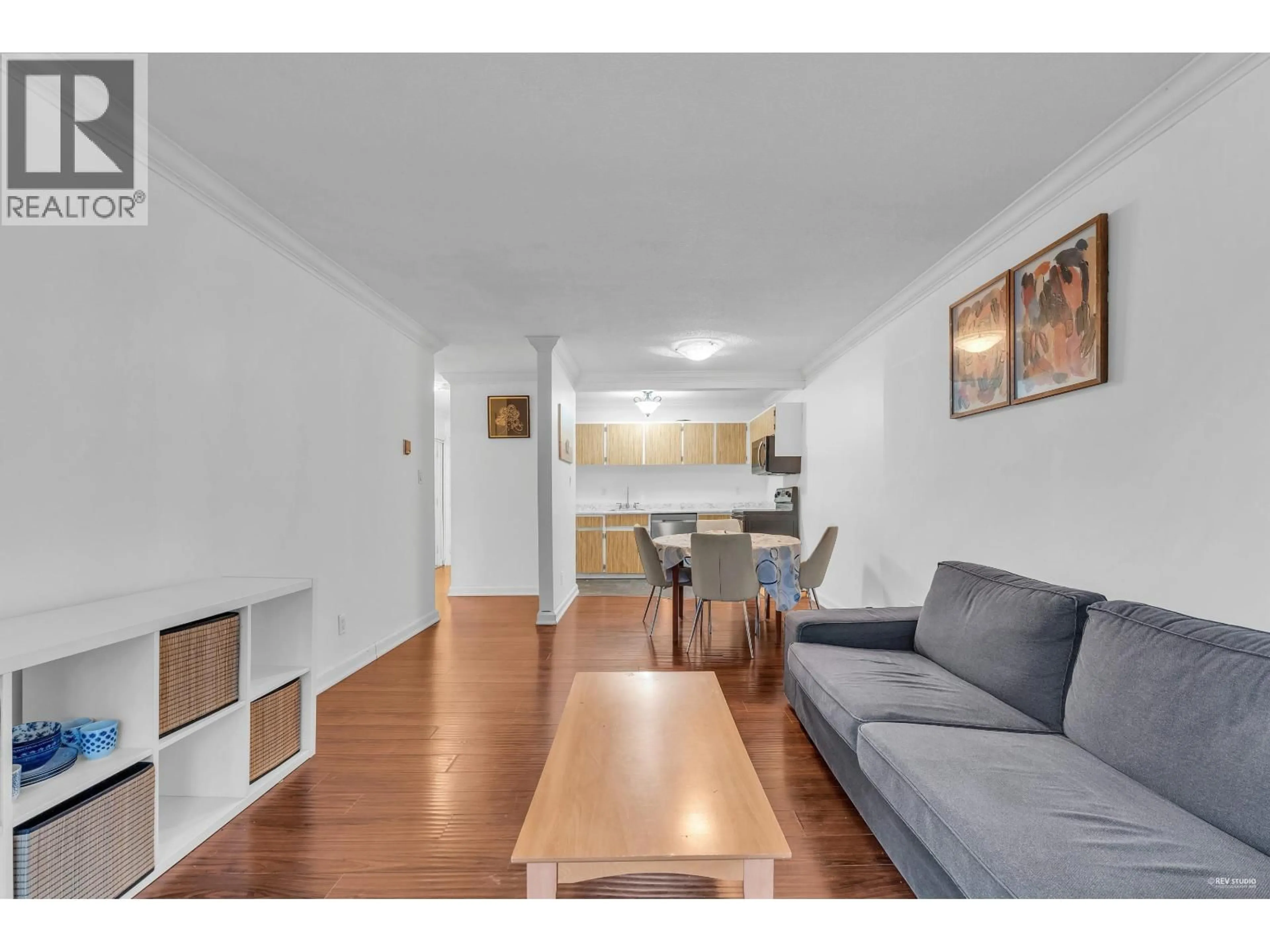 Living room with furniture, wood/laminate floor for 308 - 601 NORTH ROAD, Coquitlam British Columbia V3J1P1