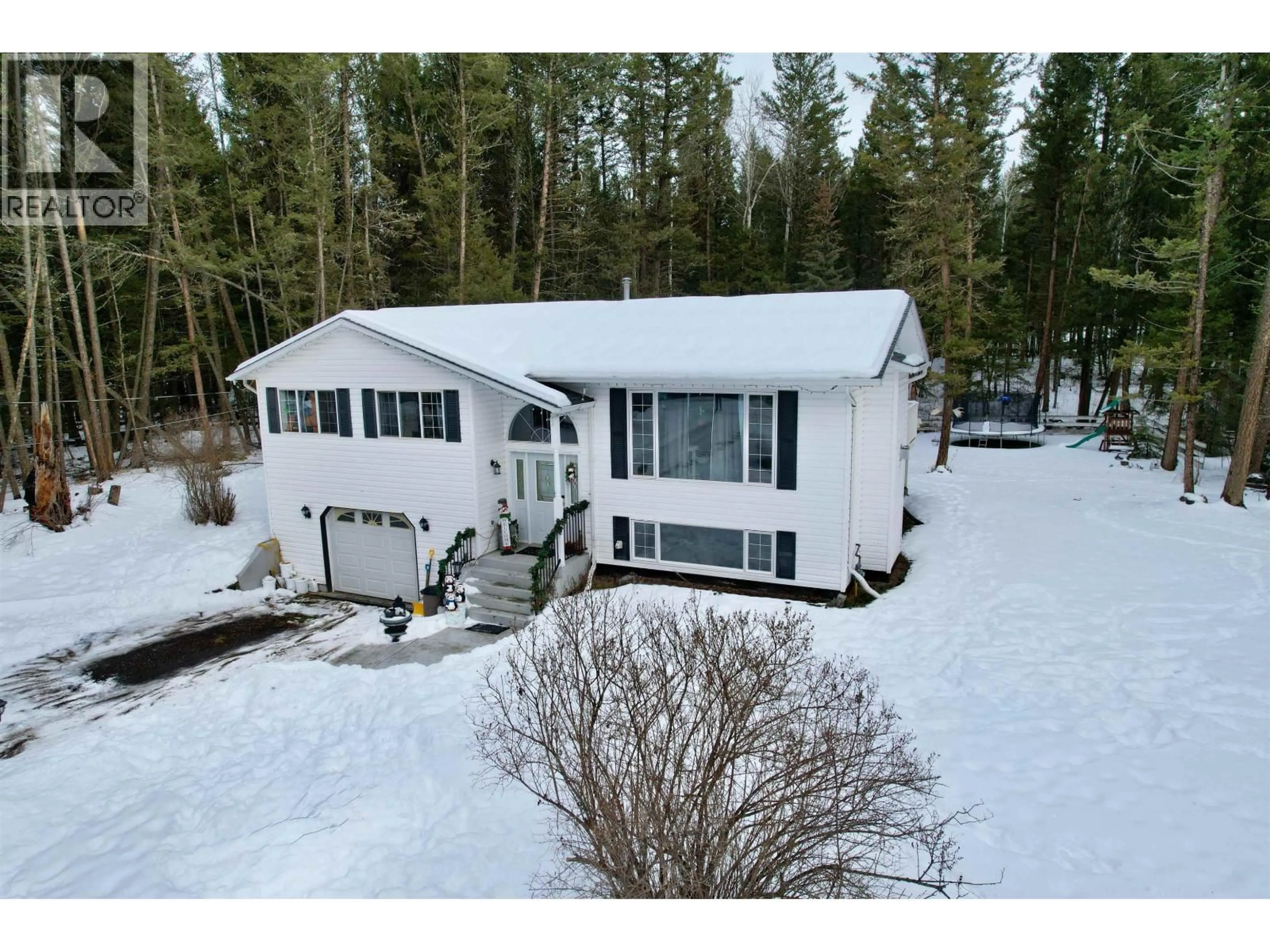 A pic from outside/outdoor area/front of a property/back of a property/a pic from drone, unknown for 4983 SMITH ROAD, 108 Mile Ranch British Columbia V0K2Z0
