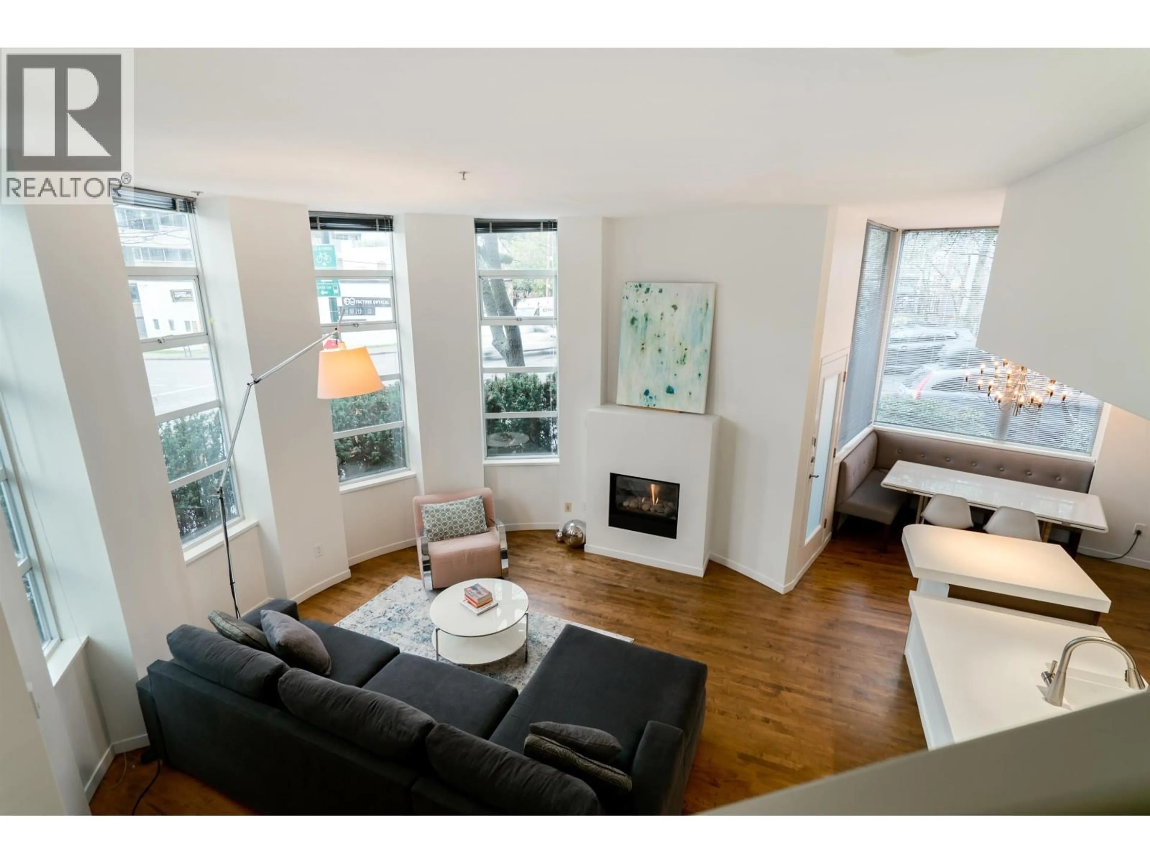 Living room with furniture, wood/laminate floor for 2315 ASH STREET, Vancouver British Columbia V5Z3C3