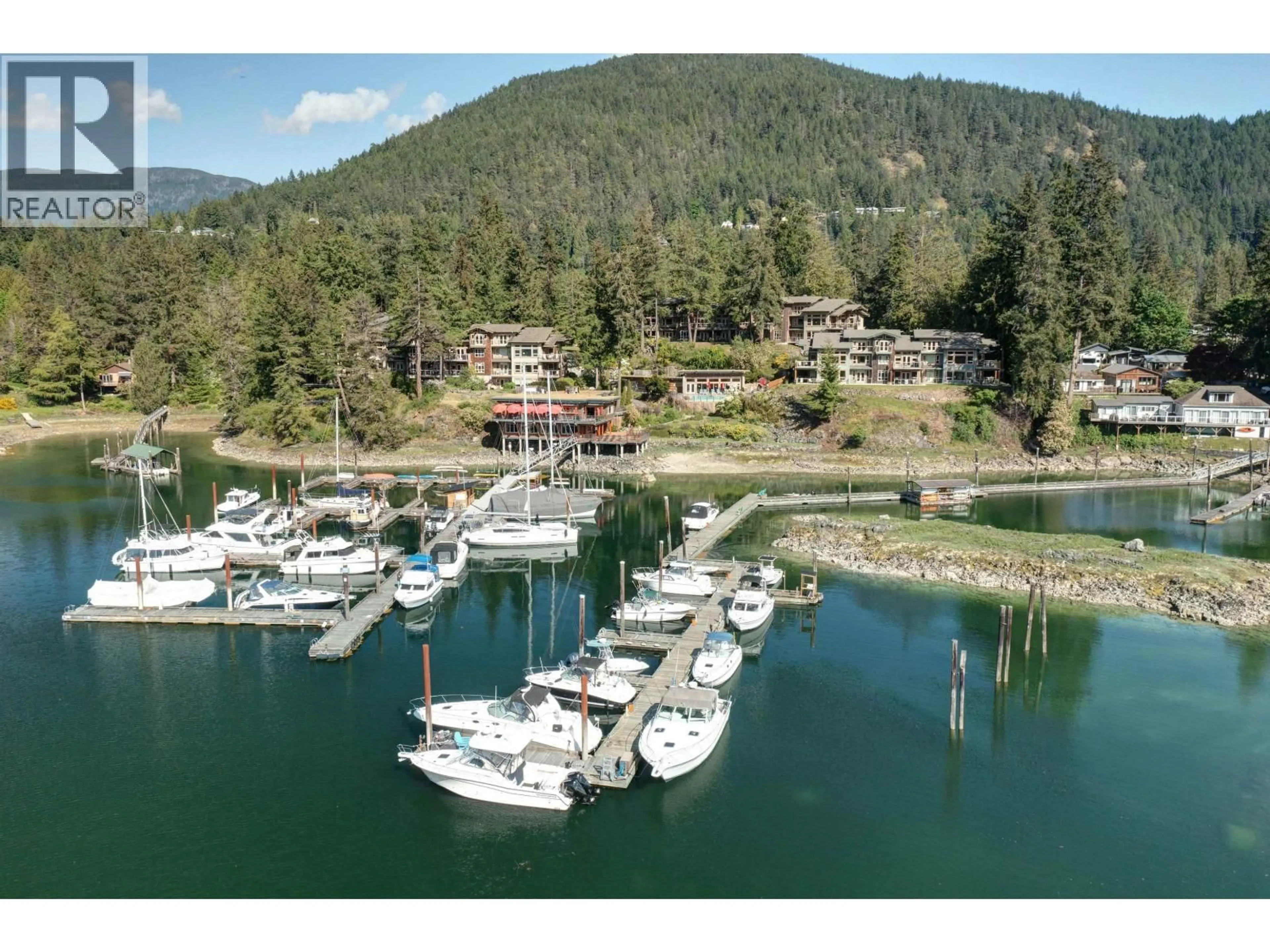 A pic from outside/outdoor area/front of a property/back of a property/a pic from drone, water/lake/river/ocean view for 12849 LAGOON ROAD, Madeira Park British Columbia V0N2H0
