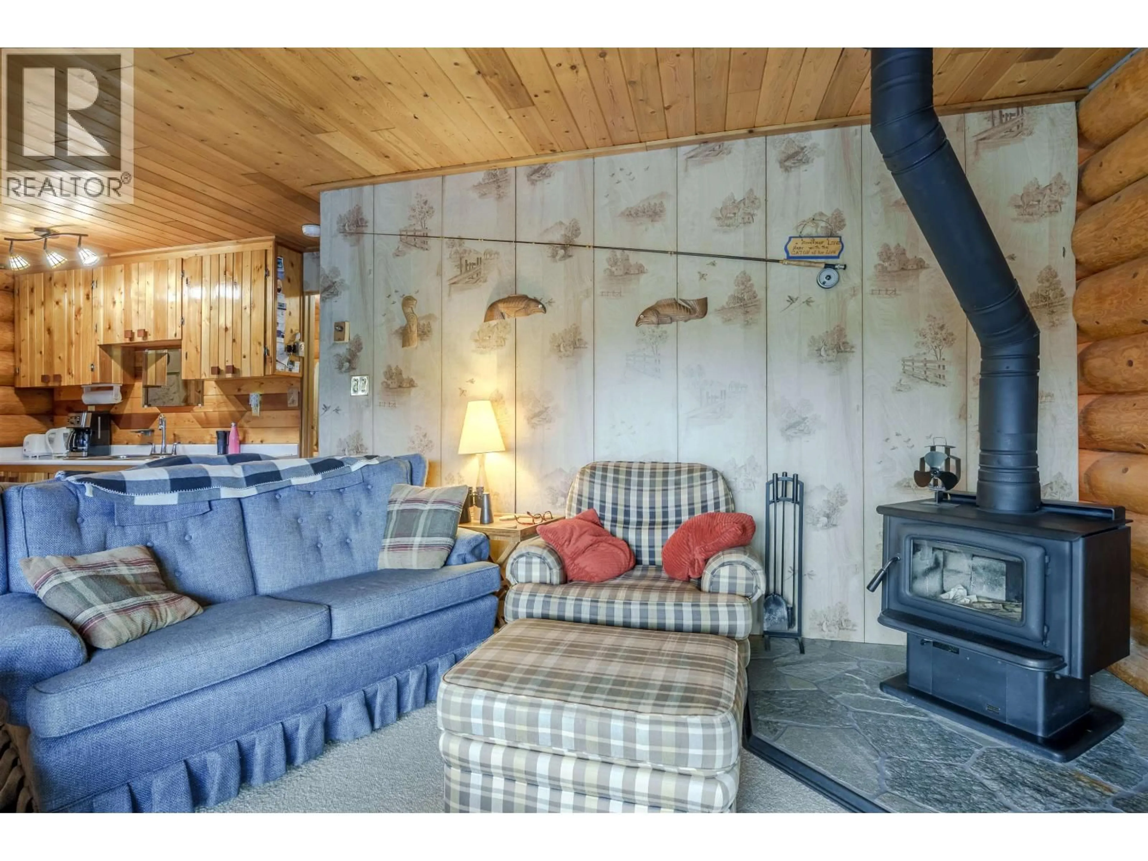 Living room with furniture, unknown for 7561 MCCARTHY ROAD, Bridge Lake British Columbia V0K1X2