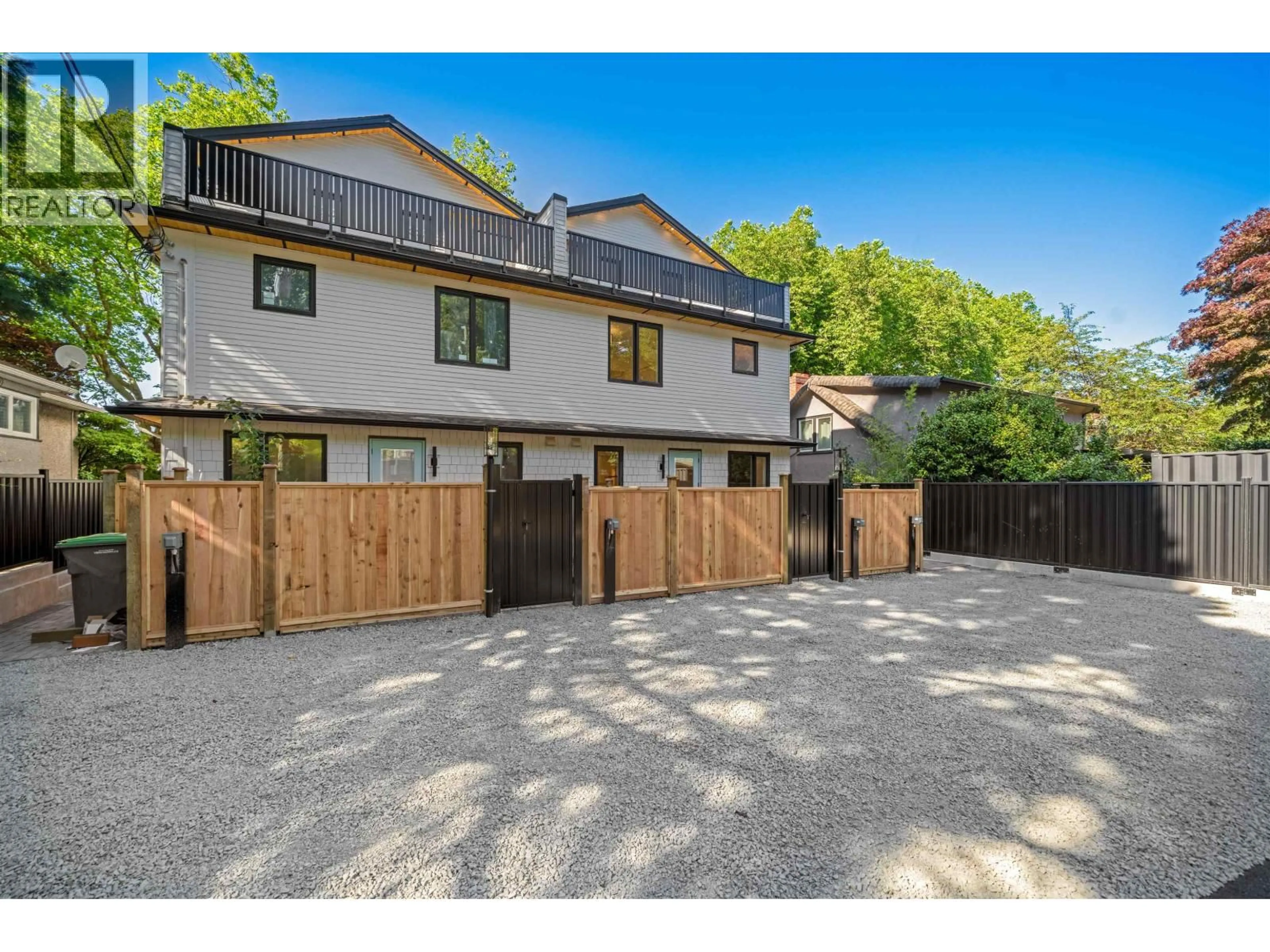 A pic from outside/outdoor area/front of a property/back of a property/a pic from drone, street for 4 - 3836 8TH AVENUE, Vancouver British Columbia V6R1Z4