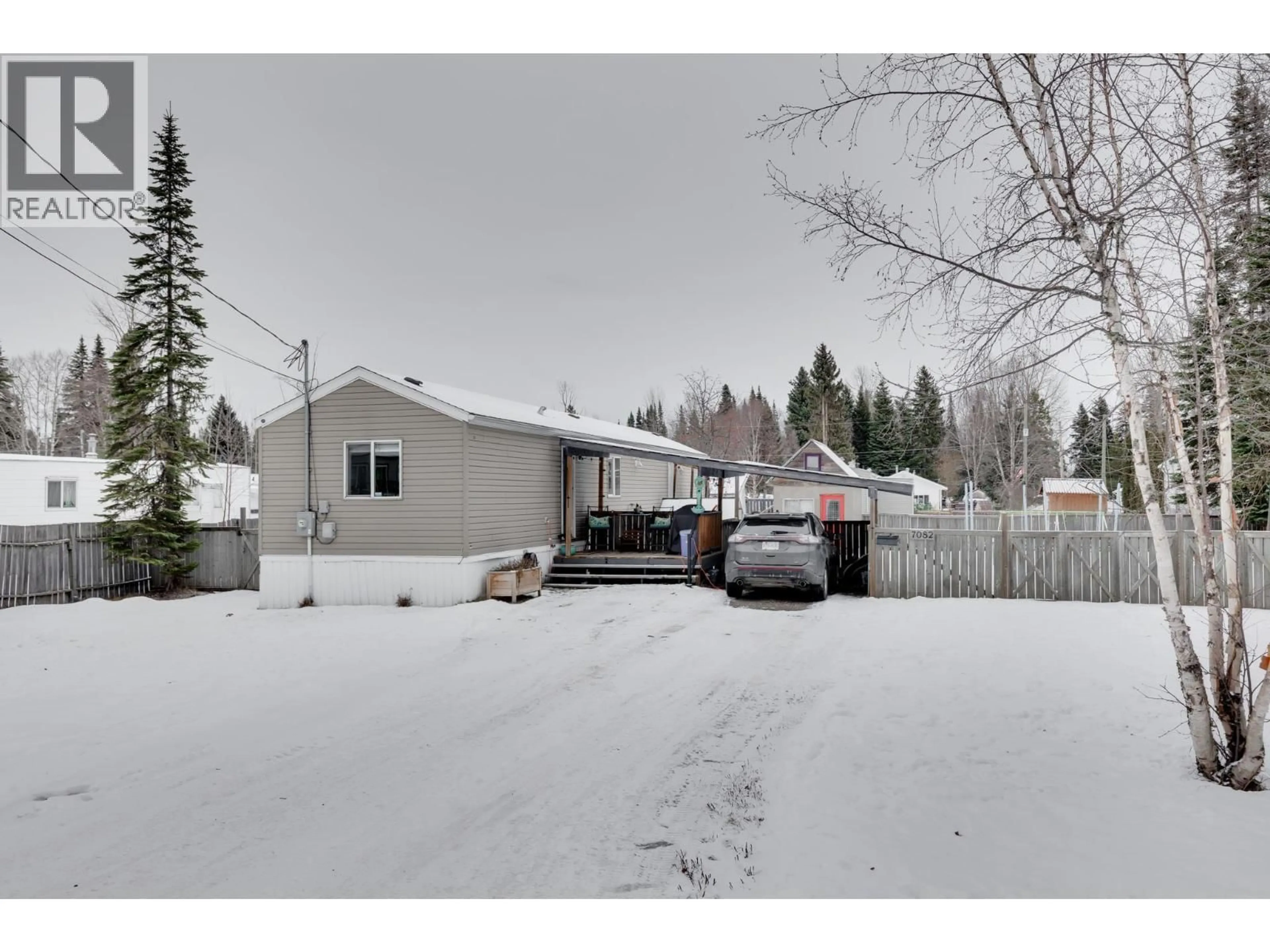 A pic from outside/outdoor area/front of a property/back of a property/a pic from drone, street for 7082 KENNEDY CRESCENT, Prince George British Columbia V2K2P8