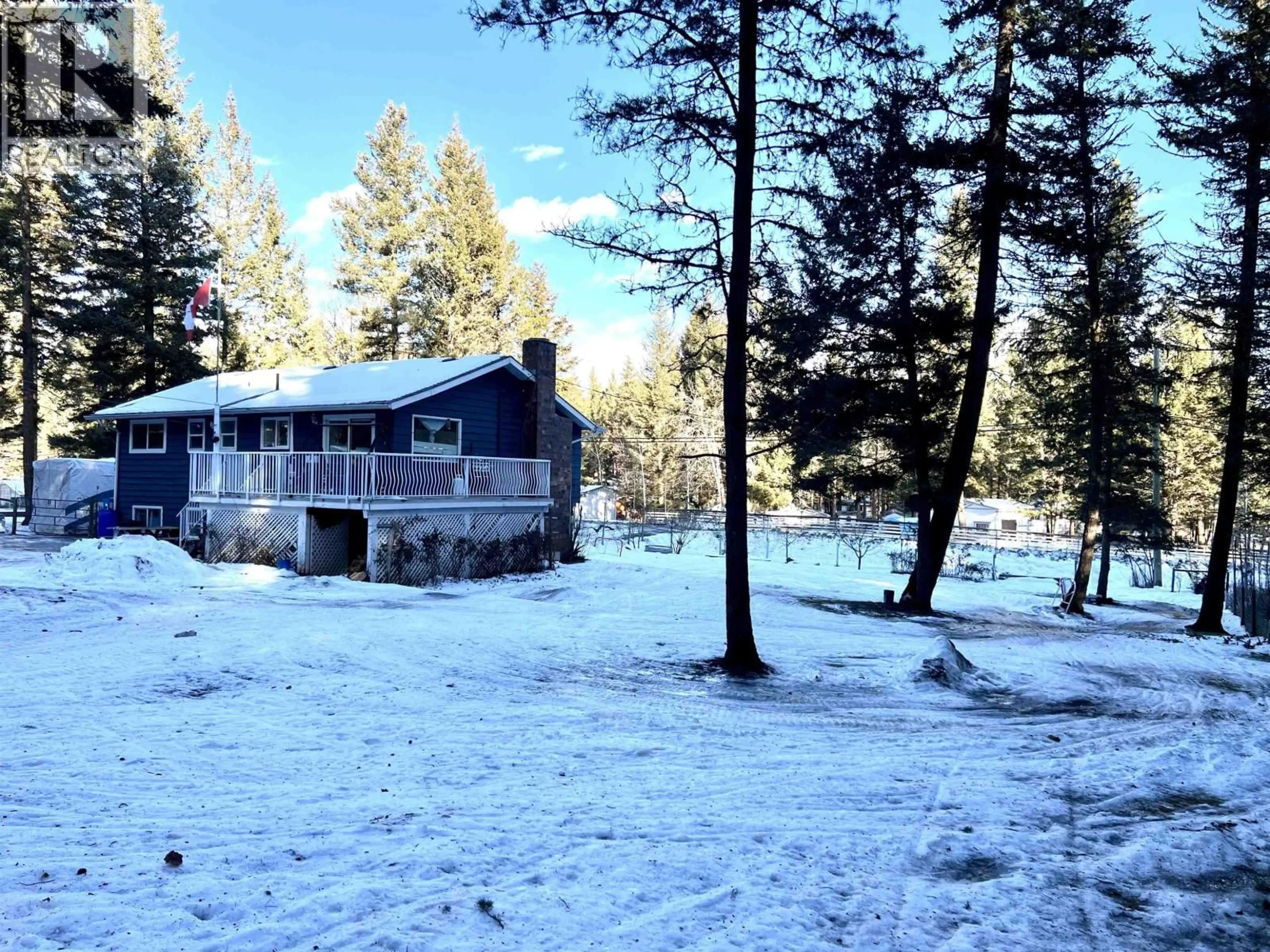 A pic from outside/outdoor area/front of a property/back of a property/a pic from drone, unknown for 5047 EASZEE DRIVE, 108 Mile Ranch British Columbia V0K2Z0