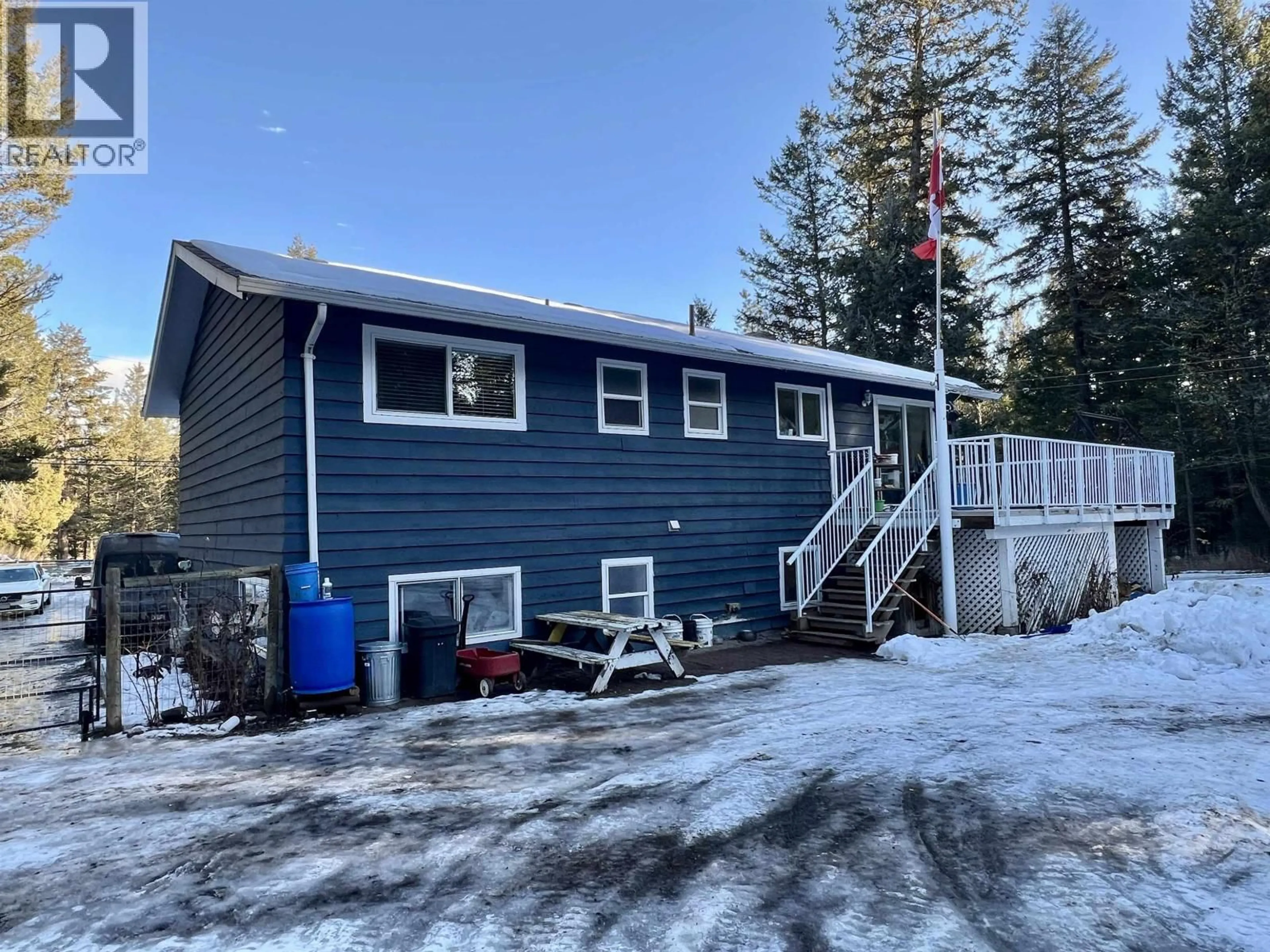 A pic from outside/outdoor area/front of a property/back of a property/a pic from drone, unknown for 5047 EASZEE DRIVE, 108 Mile Ranch British Columbia V0K2Z0