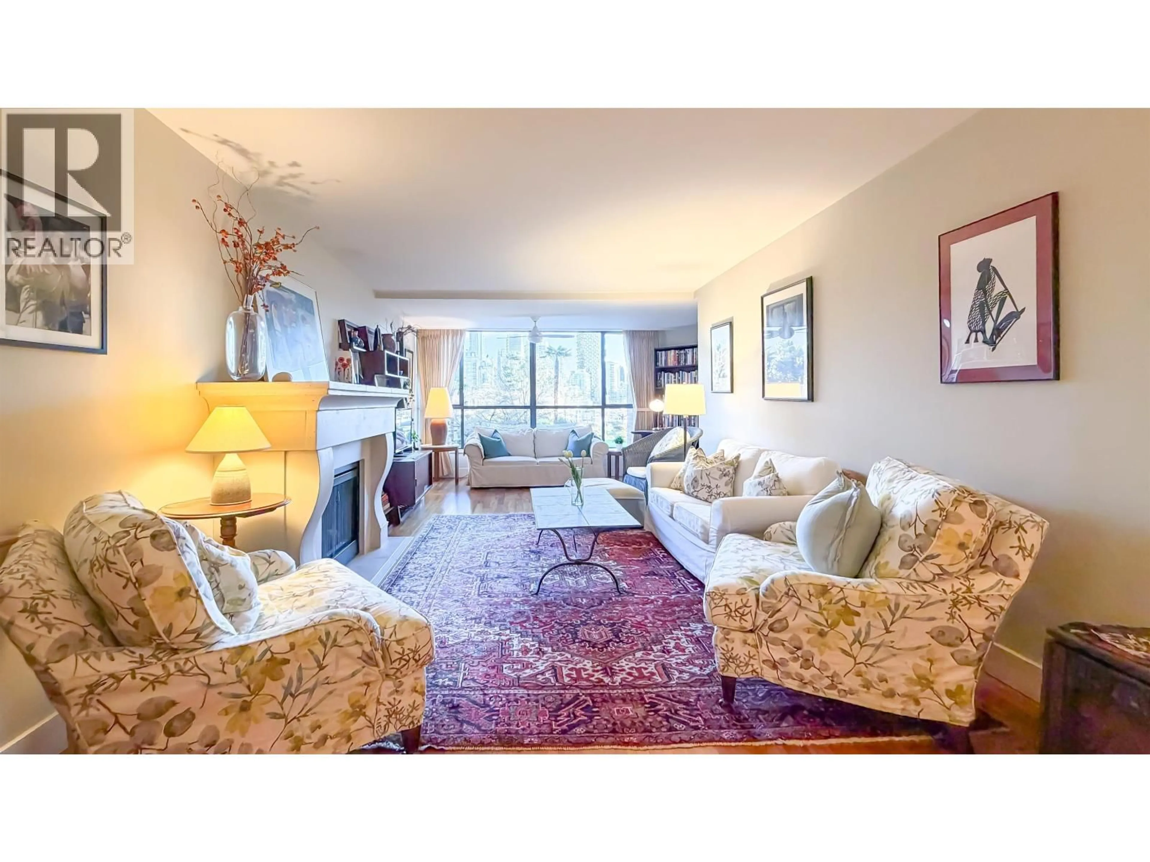 Living room with furniture, carpet floor for 109 - 1490 PENNYFARTHING DRIVE, Vancouver British Columbia V6J4Z3