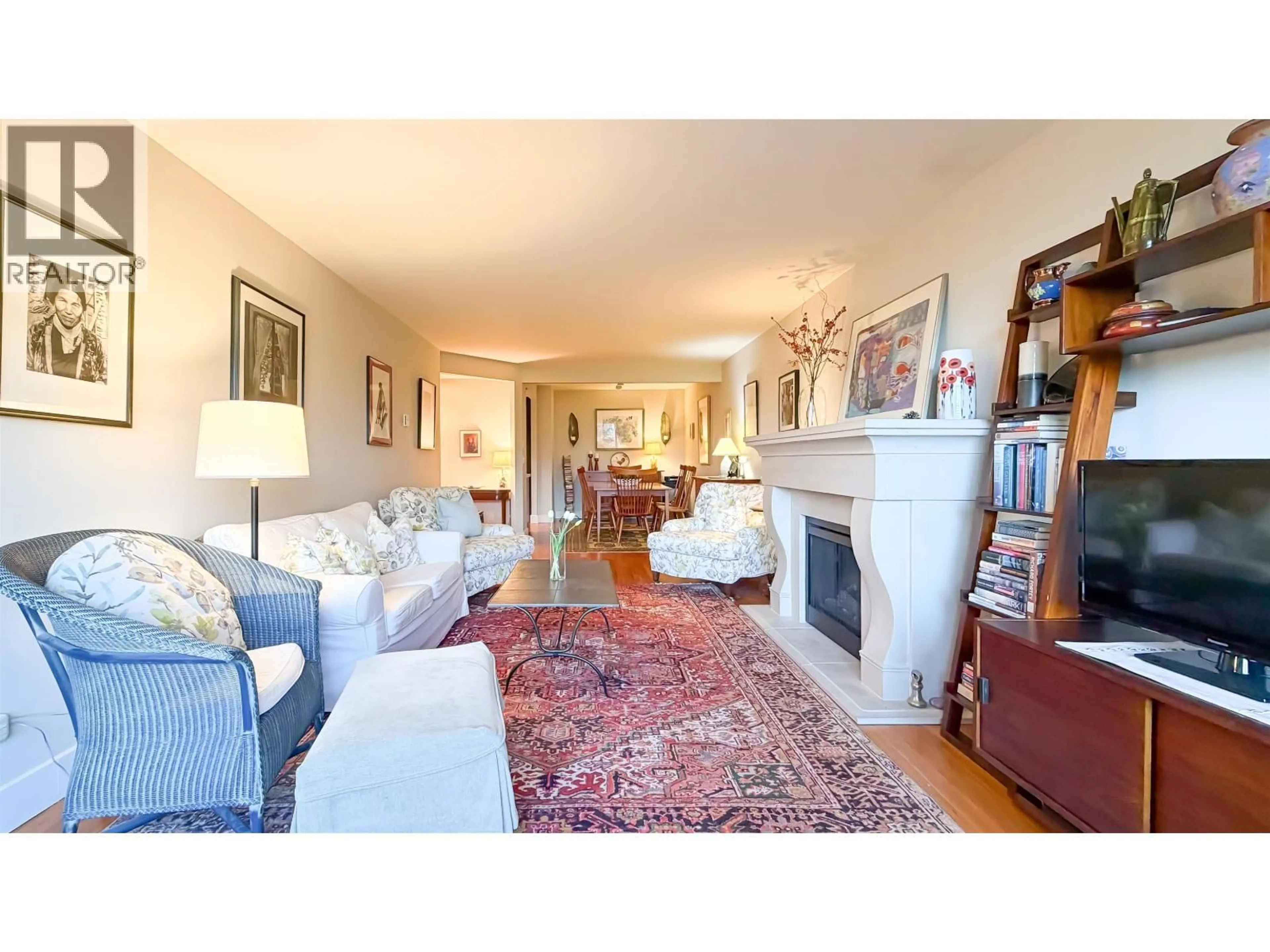 Living room with furniture, unknown for 109 - 1490 PENNYFARTHING DRIVE, Vancouver British Columbia V6J4Z3