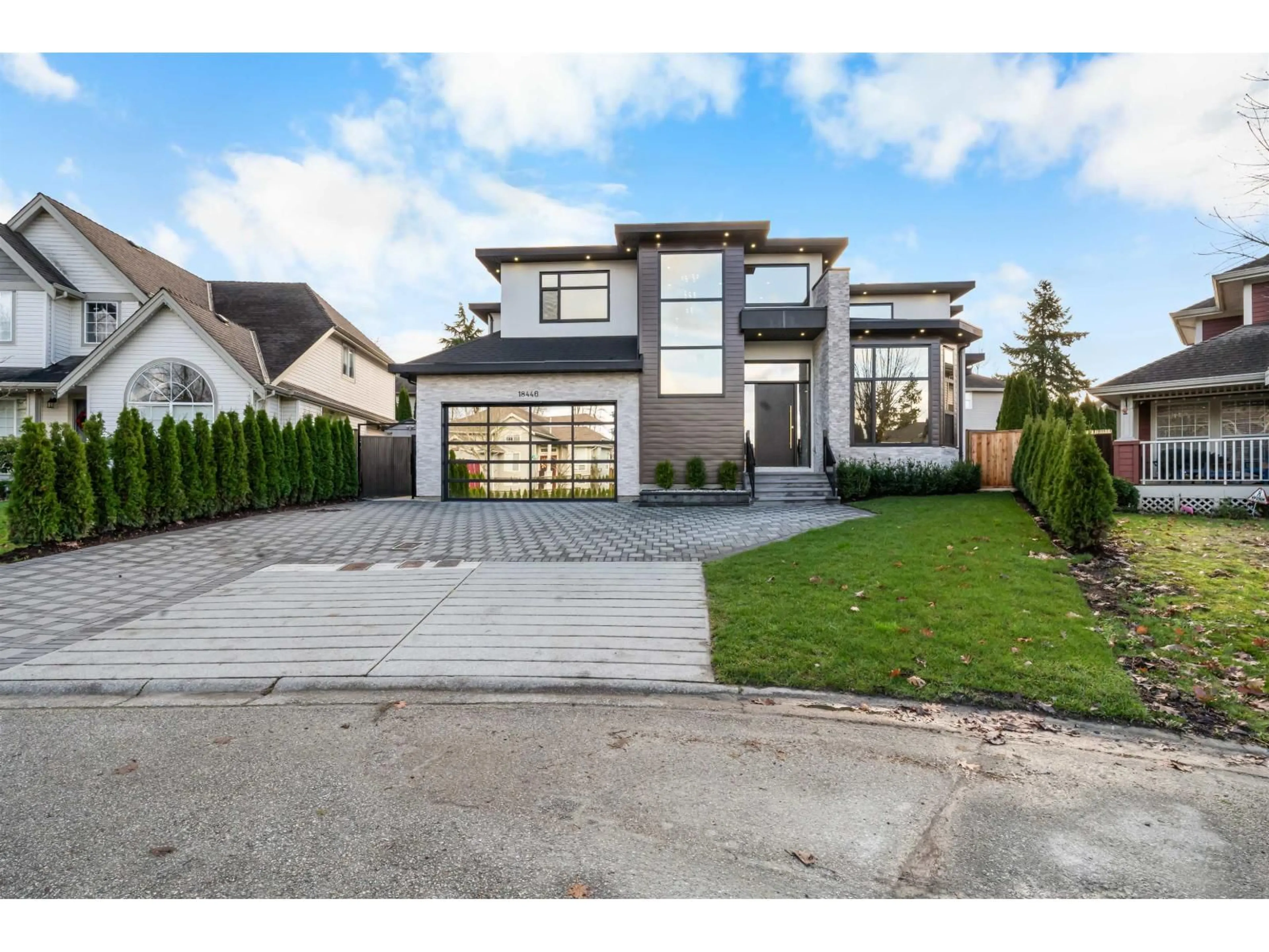 Home with brick exterior material, street for 18446 68A AVENUE, Surrey British Columbia V3S9H9