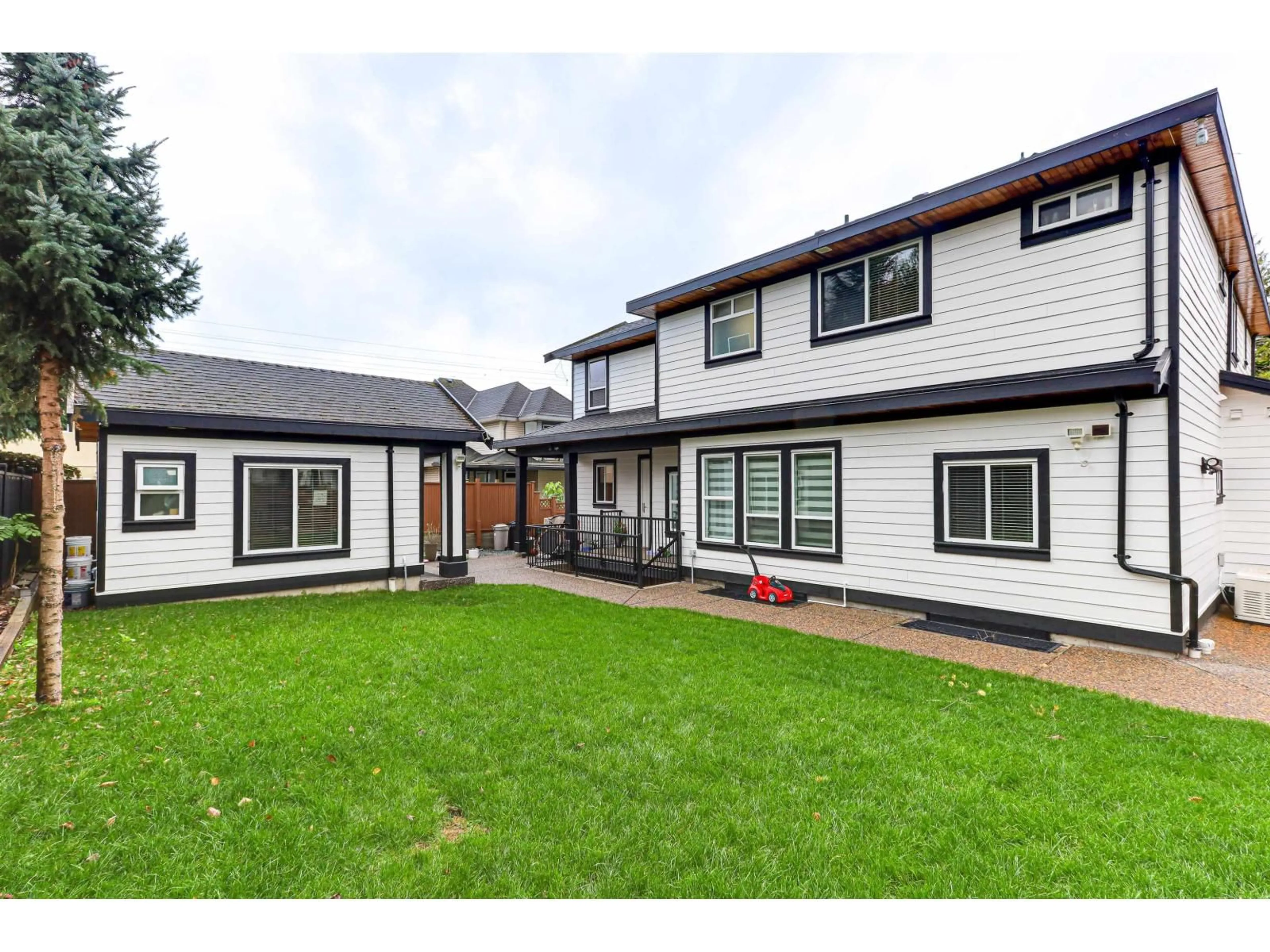 A pic from outside/outdoor area/front of a property/back of a property/a pic from drone, street for 7420 116 ST STREET, Delta British Columbia V4C5T2