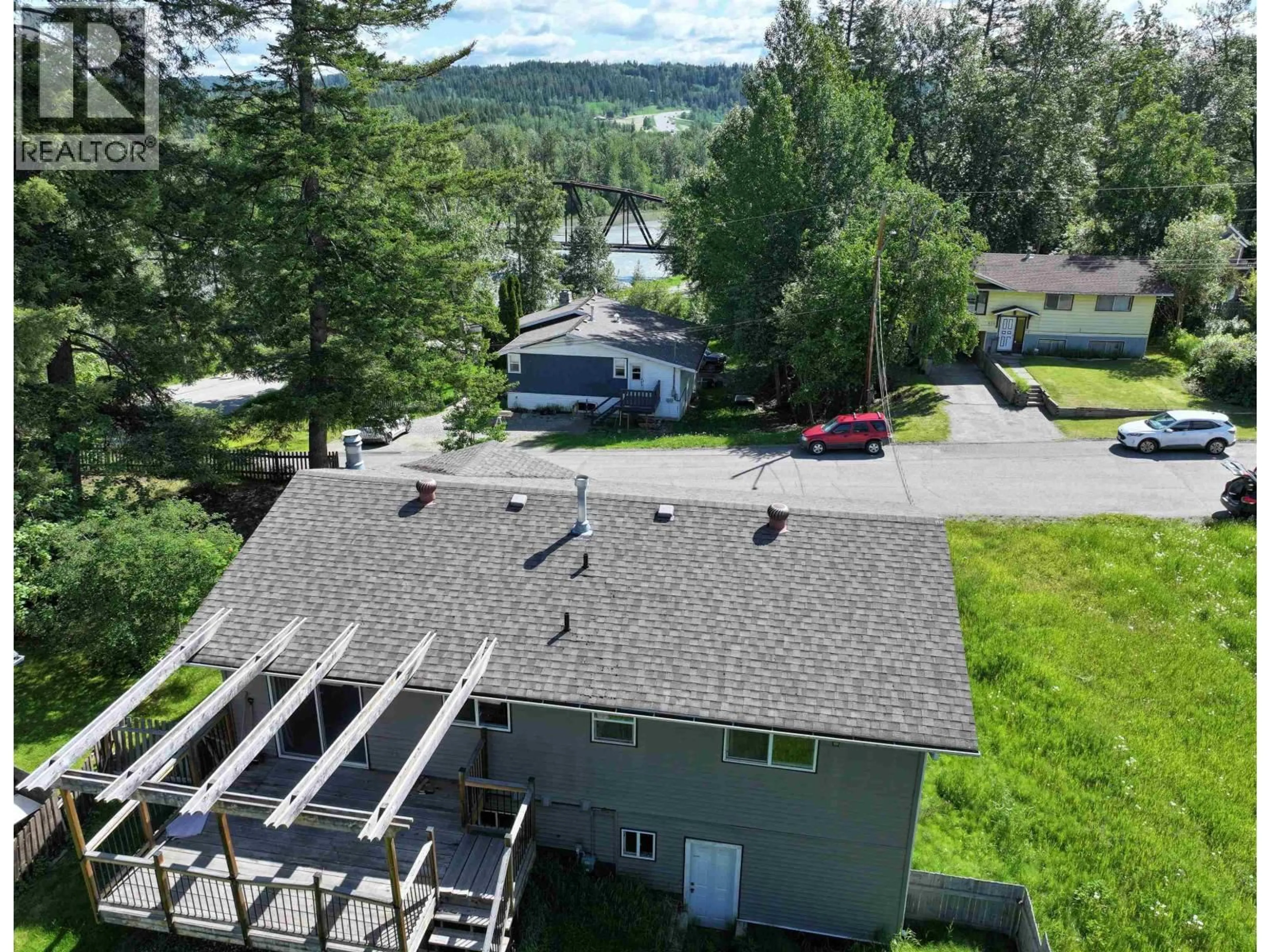 A pic from outside/outdoor area/front of a property/back of a property/a pic from drone, water/lake/river/ocean view for 679 JONES STREET, Quesnel British Columbia V2J2X3