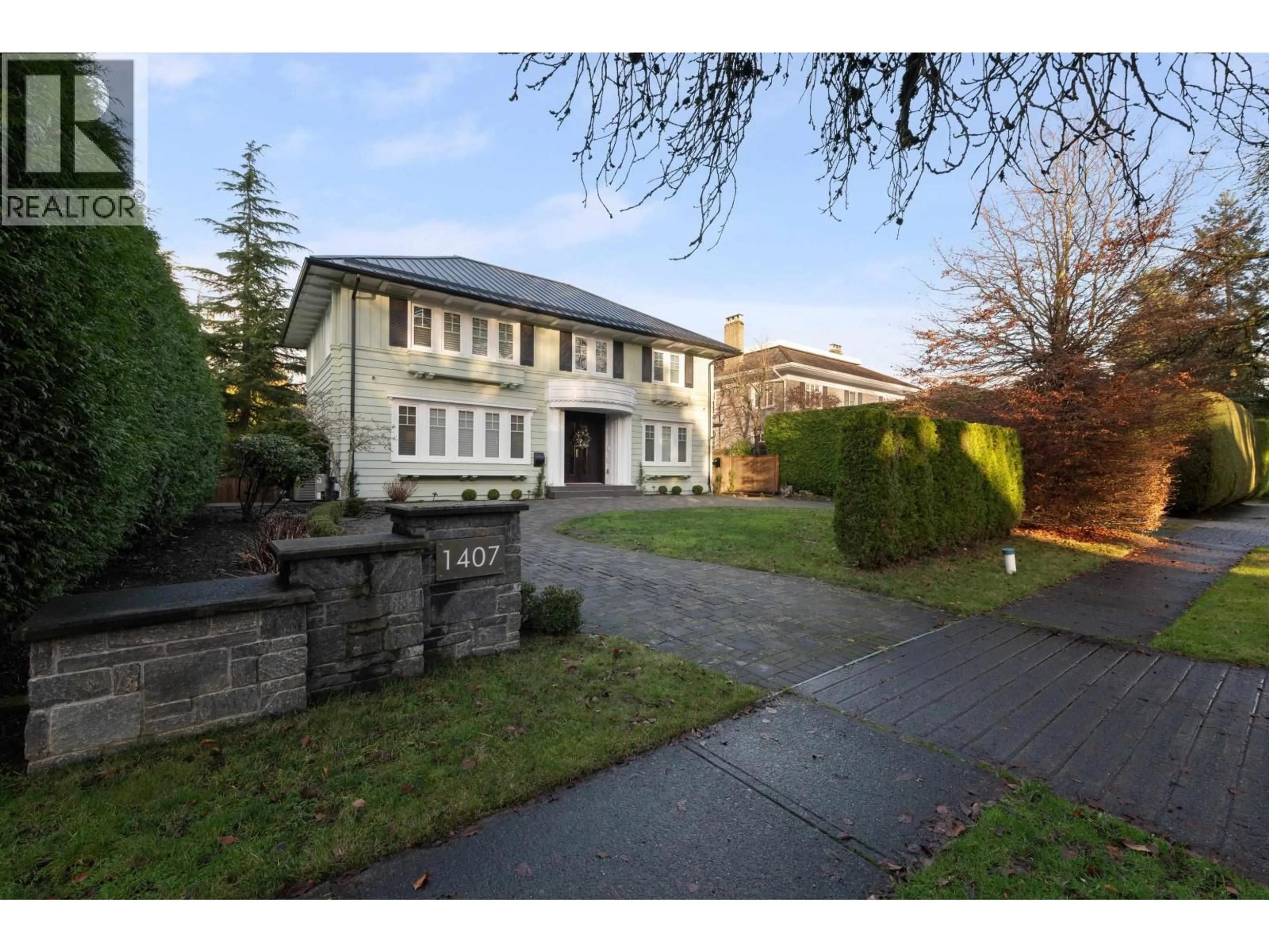 A pic from outside/outdoor area/front of a property/back of a property/a pic from drone, street for 1407 W 33RD AVENUE, Vancouver British Columbia V6M1A6