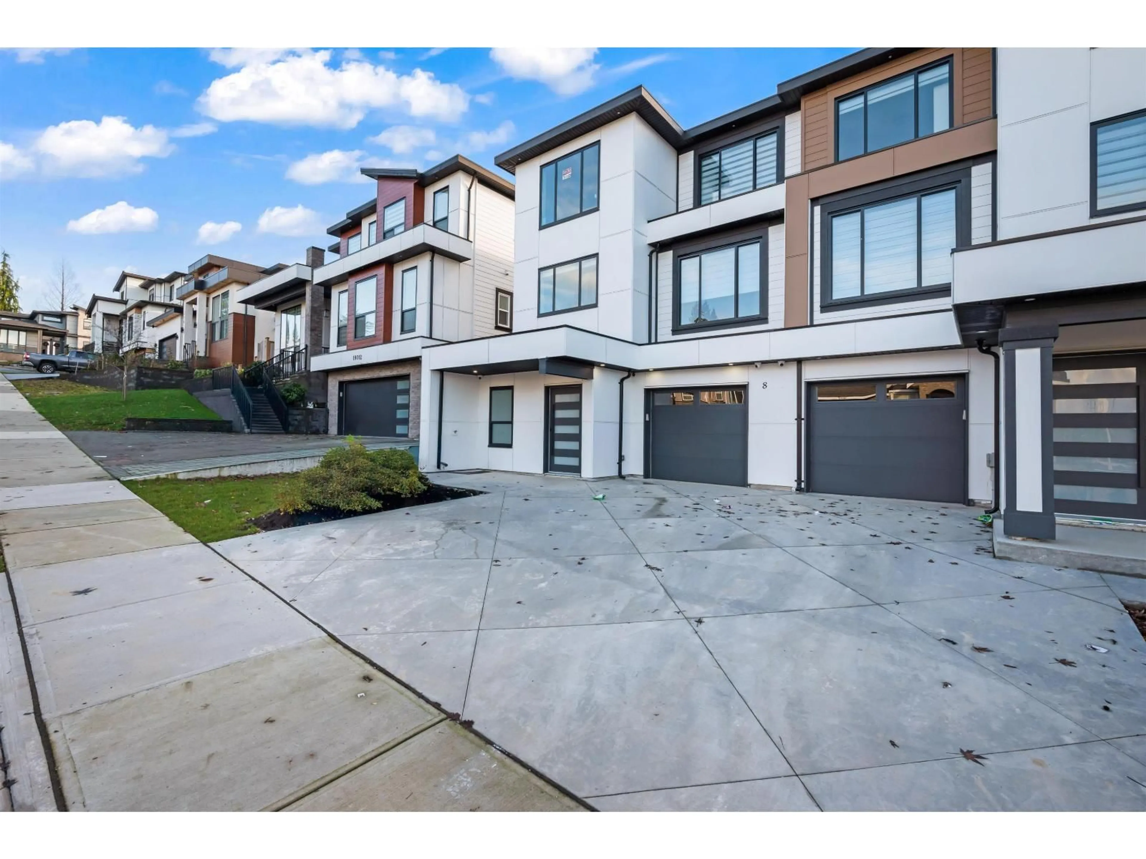 A pic from outside/outdoor area/front of a property/back of a property/a pic from drone, street for 101 - 18002 63B AVENUE, Surrey British Columbia V3S4G1