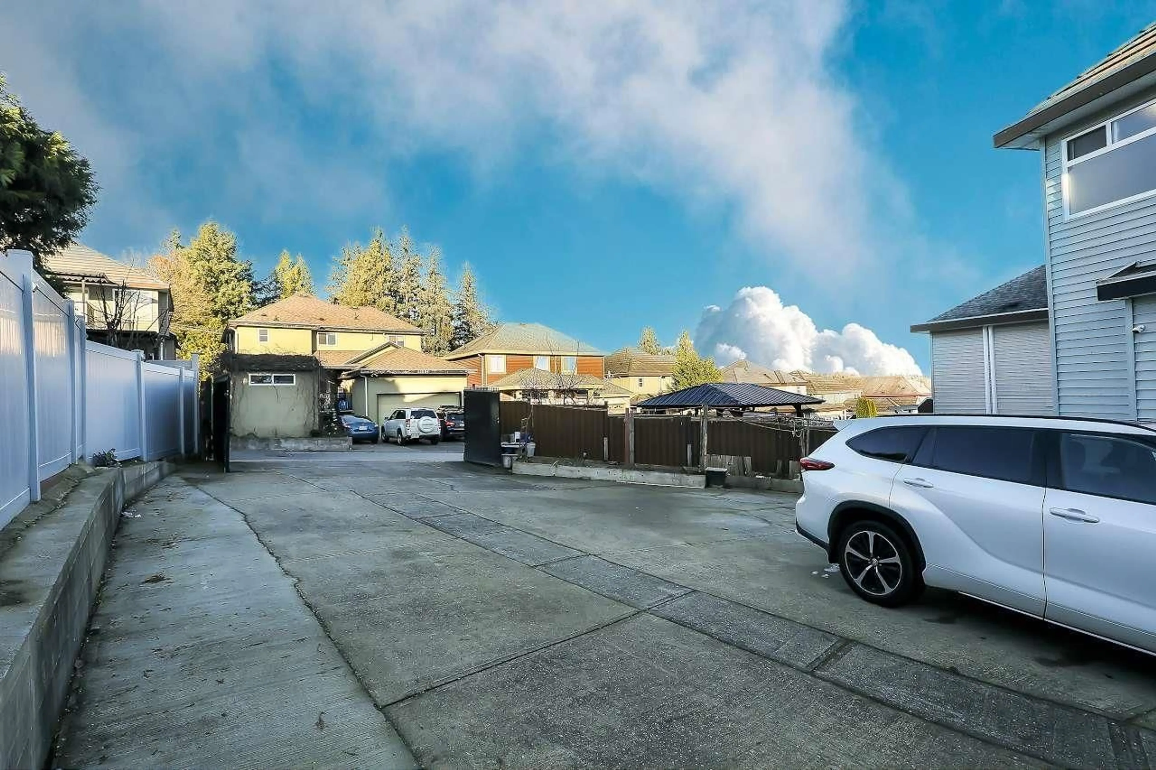 A pic from outside/outdoor area/front of a property/back of a property/a pic from drone, street for 7171 151 STREET, Surrey British Columbia V3S7Y8