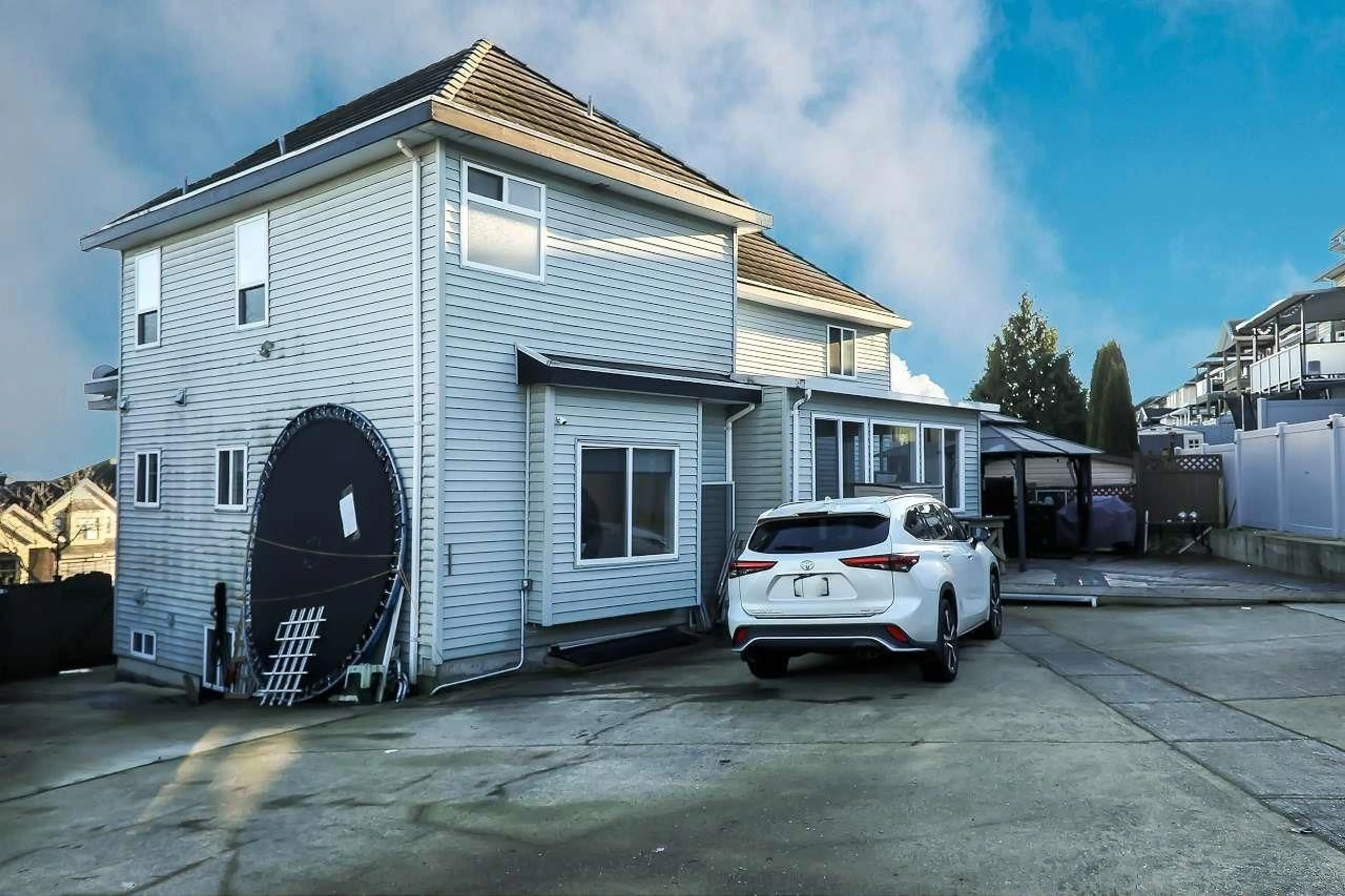A pic from outside/outdoor area/front of a property/back of a property/a pic from drone, street for 7171 151 STREET, Surrey British Columbia V3S7Y8