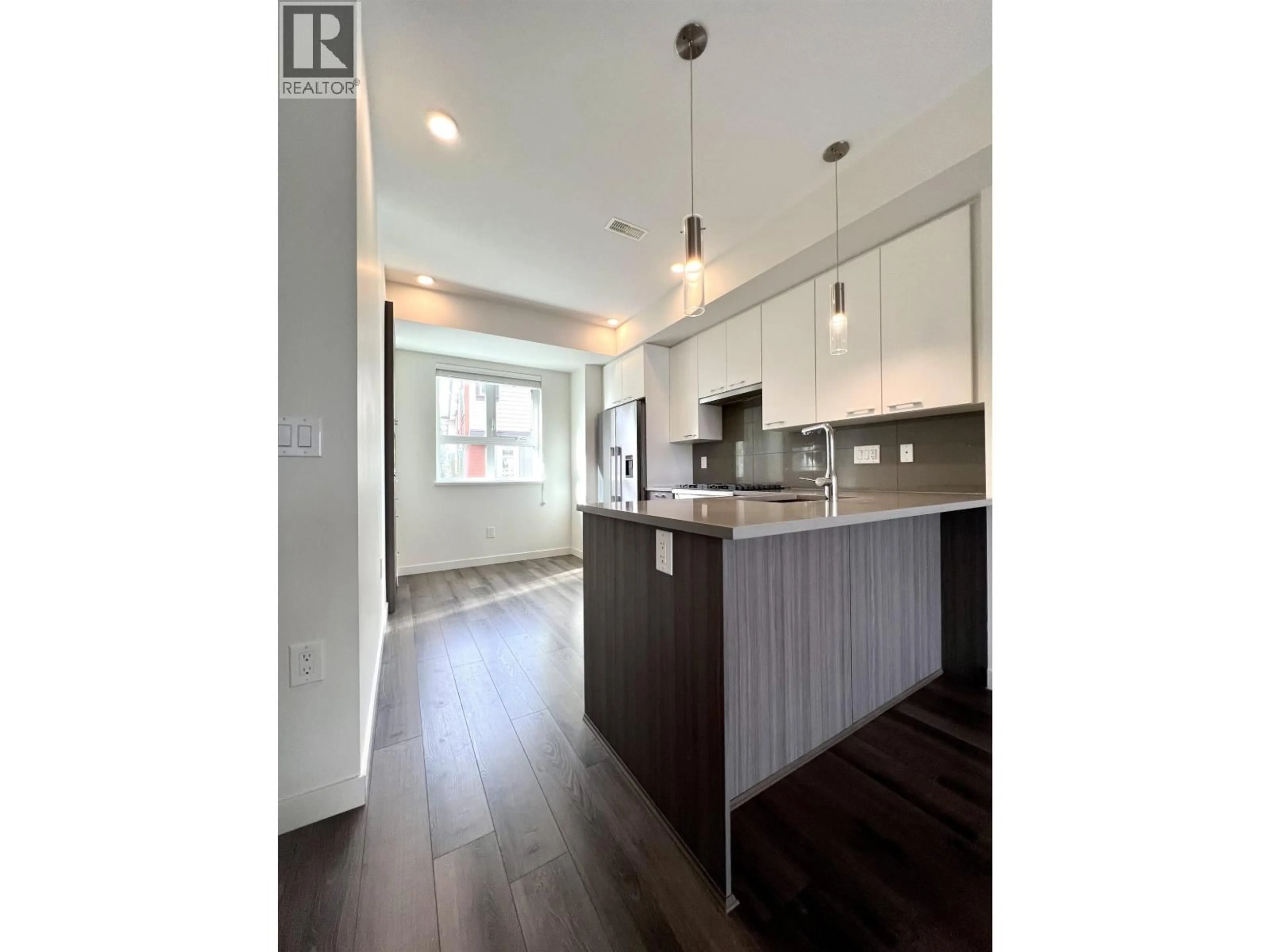 Open concept kitchen, wood/laminate floor for 49 - 10311 RIVER DRIVE, Richmond British Columbia V6X0T2