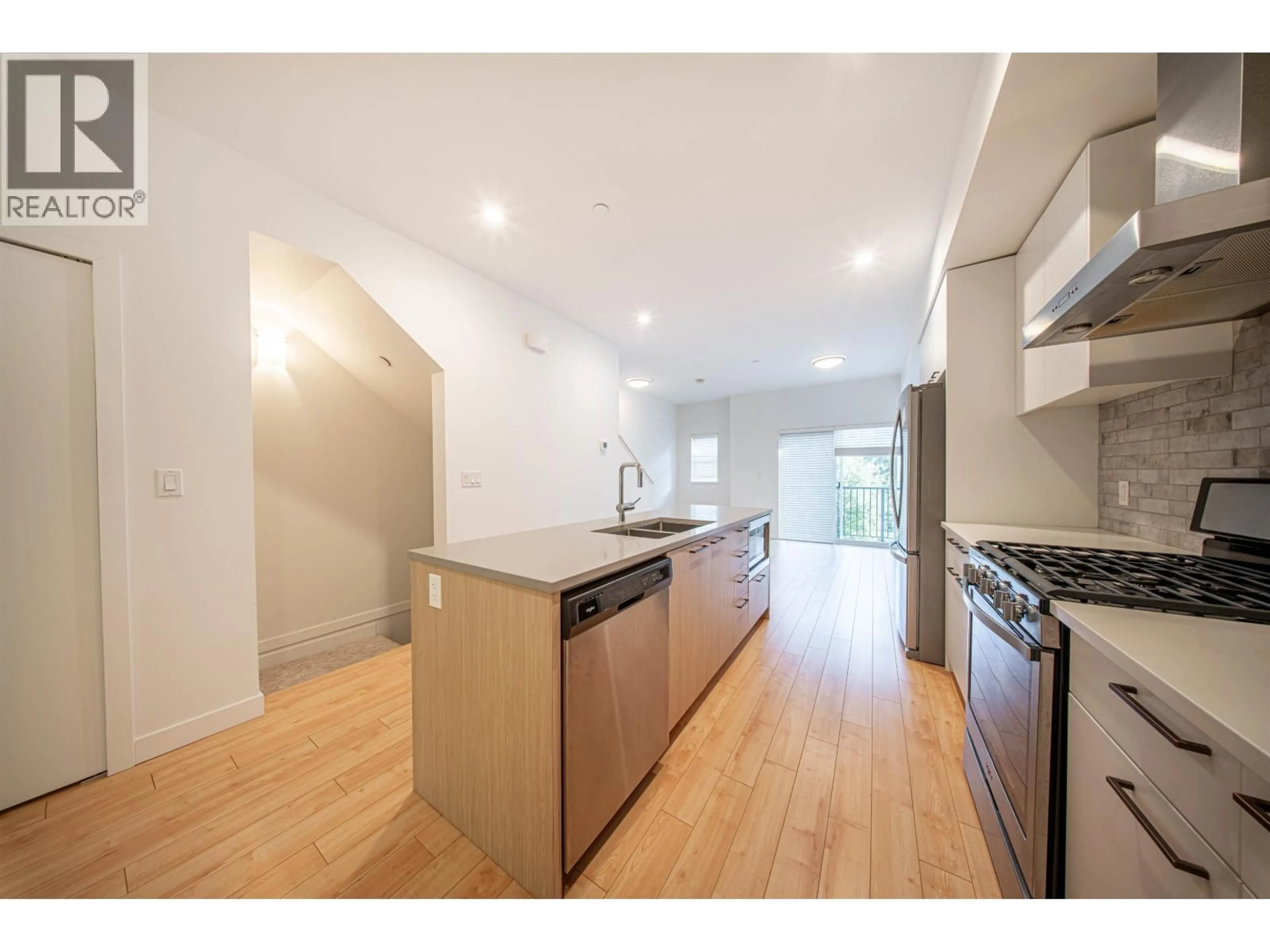 Open concept kitchen, wood/laminate floor for 2 - 22810 113 AVENUE, Maple Ridge British Columbia V2X3N2