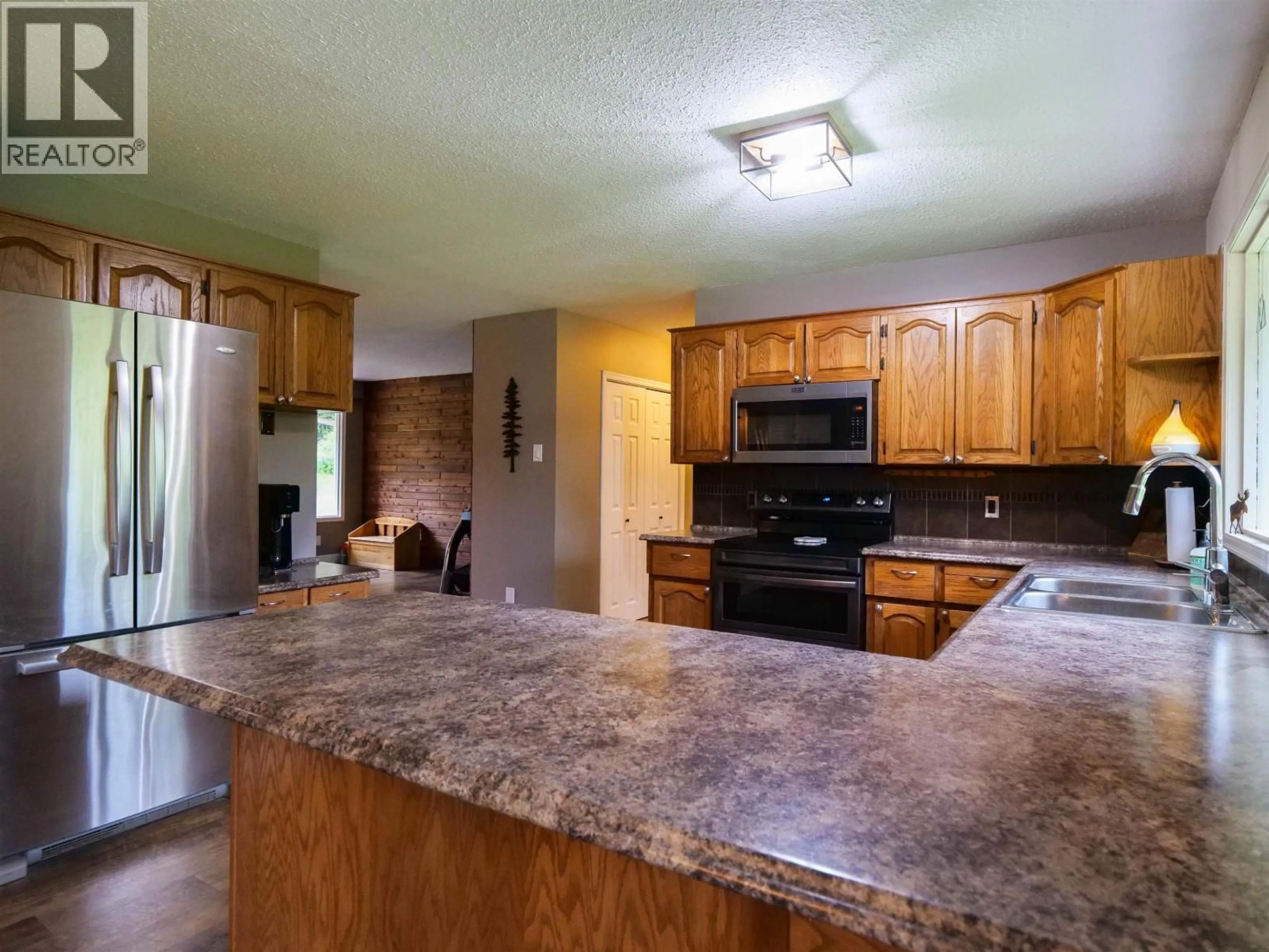 Open concept kitchen, unknown for 4678 TEN MILE LAKE ROAD, Quesnel British Columbia V2J6X2