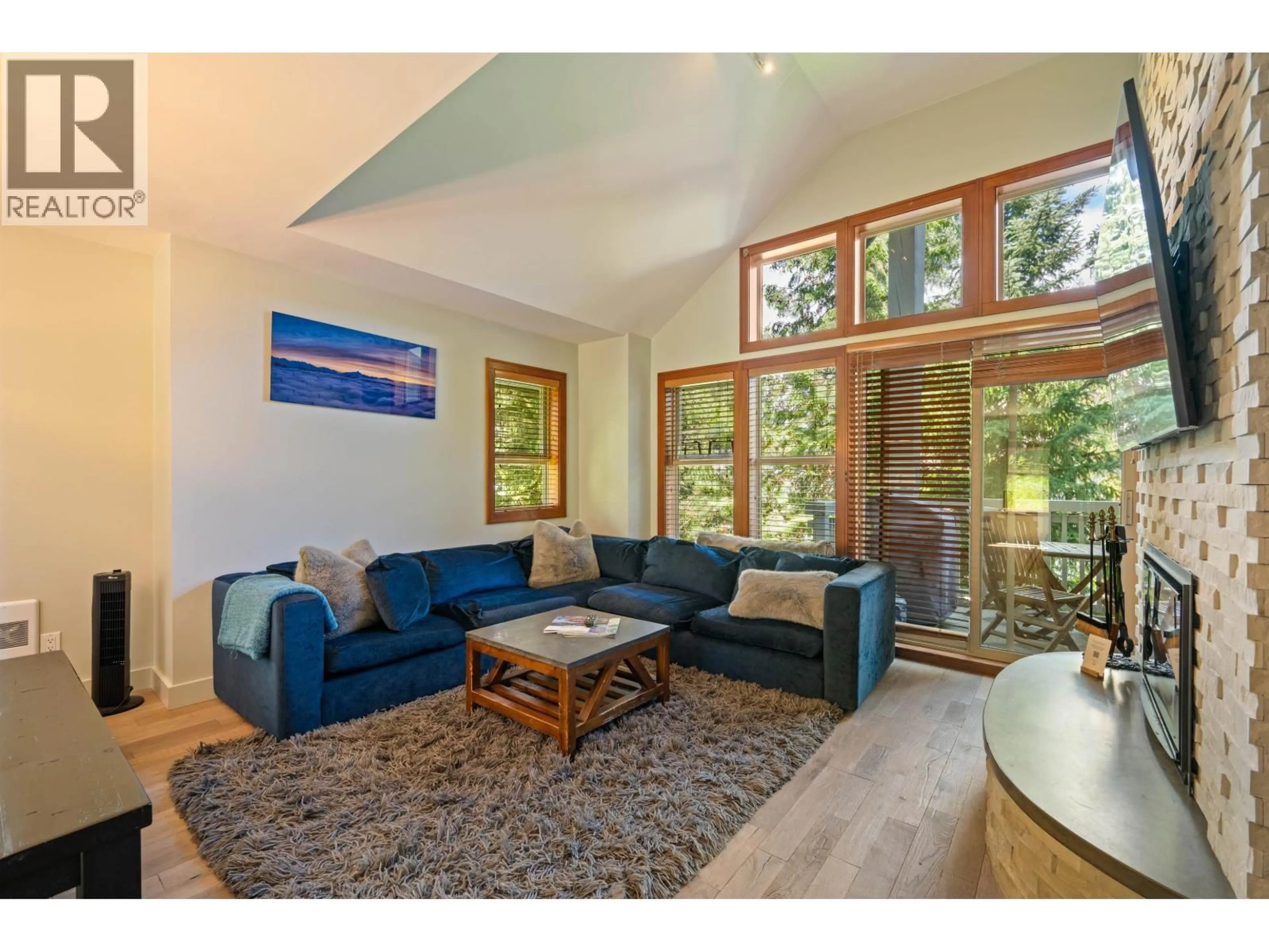 Living room with furniture, wood/laminate floor for 4 - 4661 BLACKCOMB WAY, Whistler British Columbia V8E0Z1