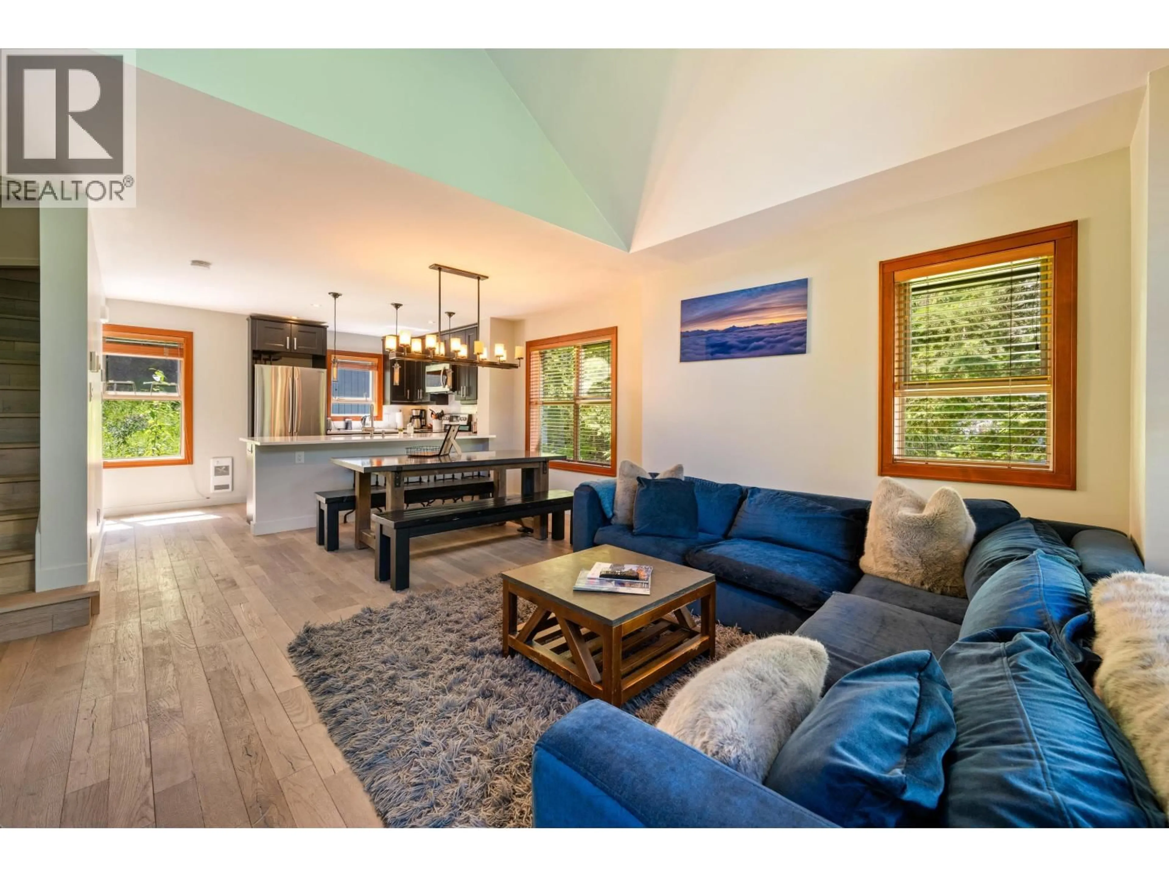 Living room with furniture, wood/laminate floor for 4 - 4661 BLACKCOMB WAY, Whistler British Columbia V8E0Z1