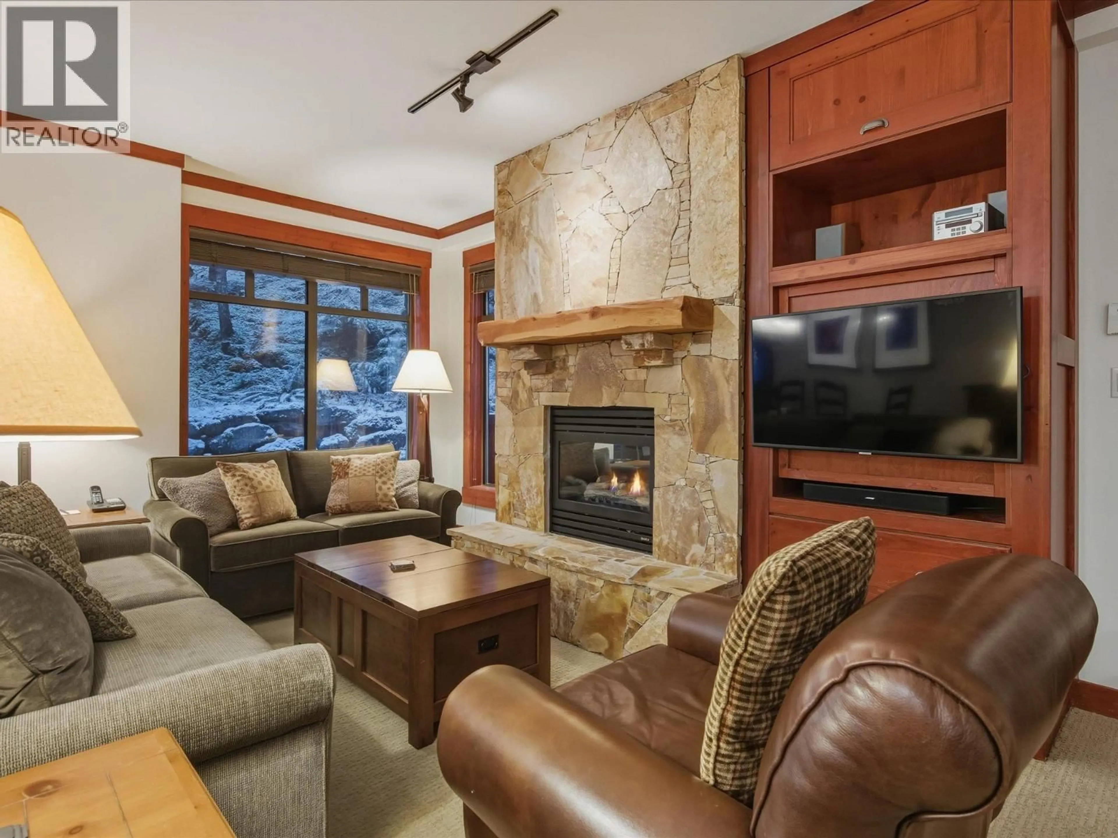 Living room with furniture, unknown for 221 - 2202 GONDOLA WAY, Whistler British Columbia V8E0M7