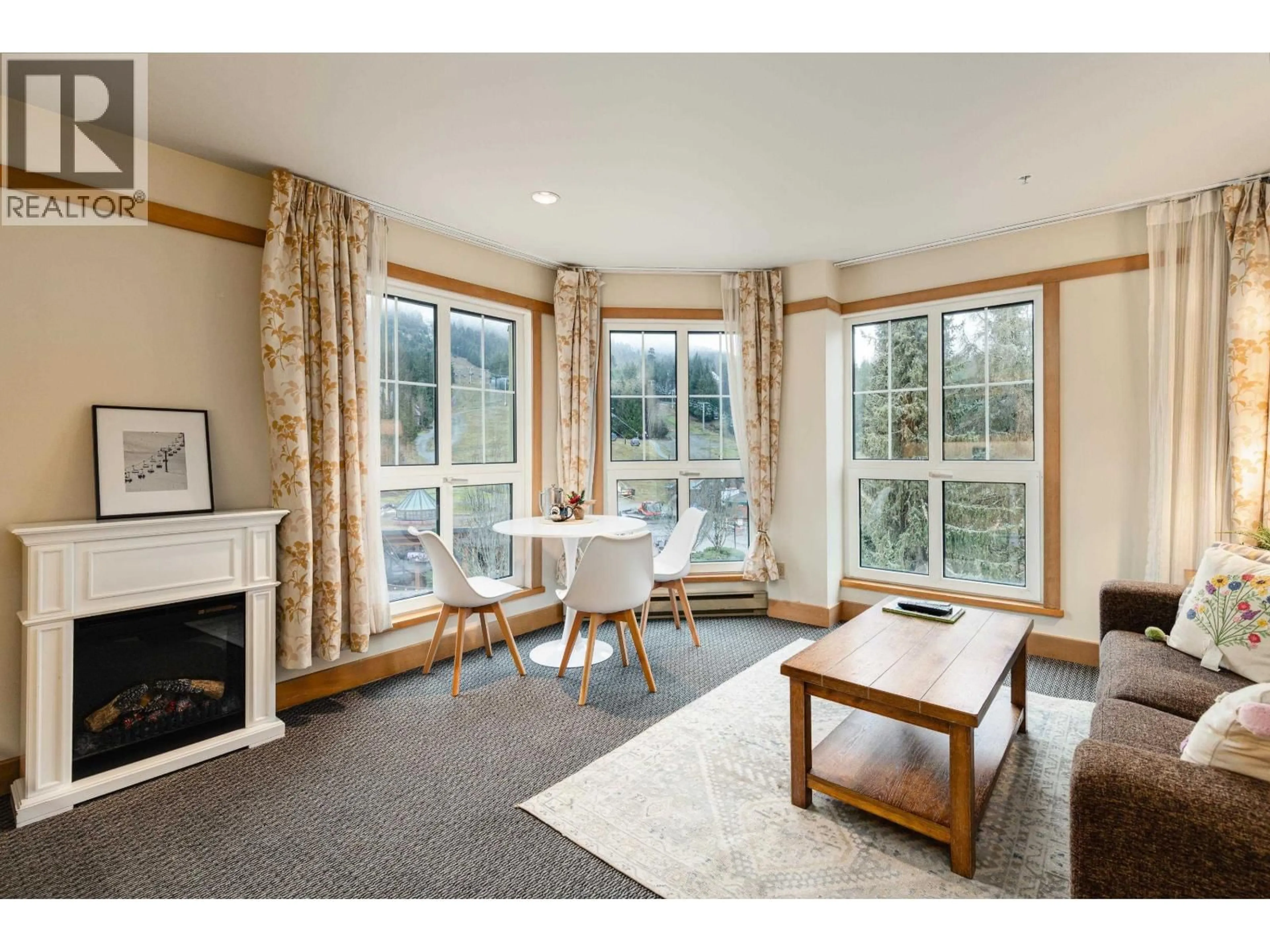 Living room with furniture, unknown for 404 - 4557 BLACKCOMB WAY, Whistler British Columbia V8E0Y2