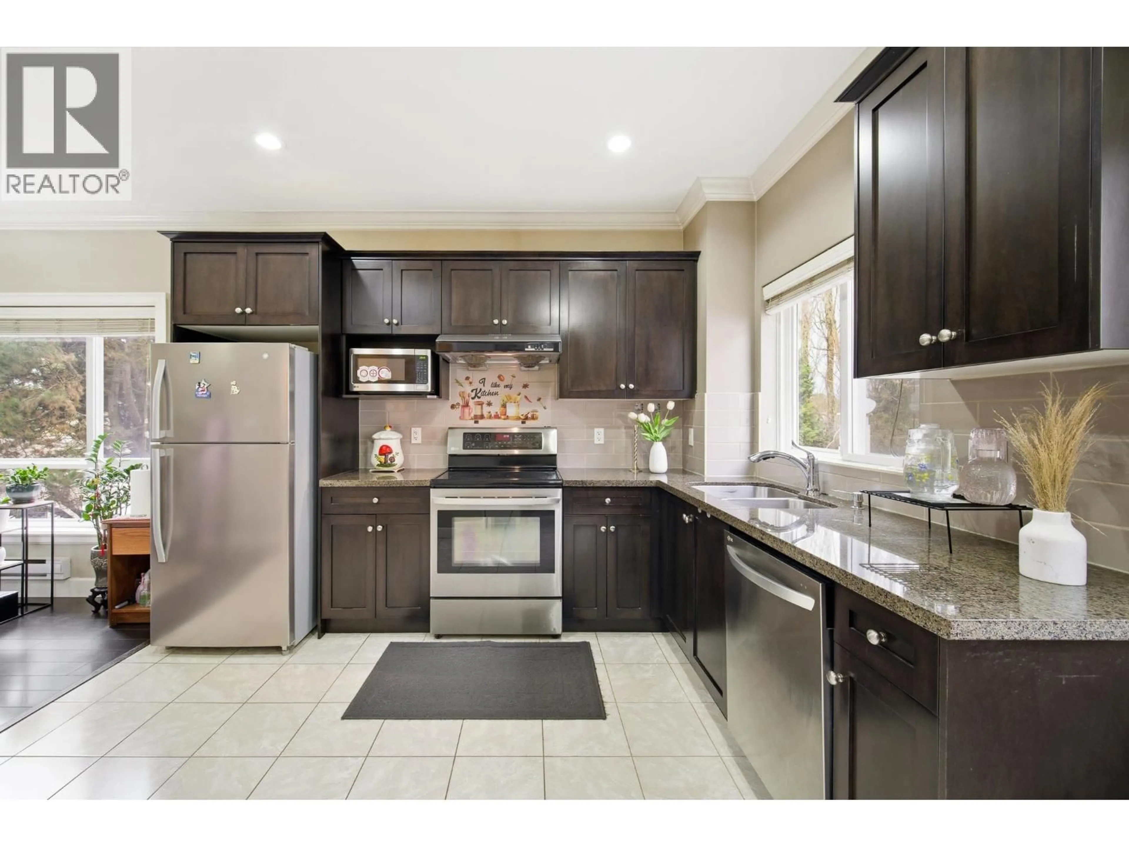 Open concept kitchen, ceramic/tile floor for 11 - 10999 STEVESTON HIGHWAY, Richmond British Columbia V7A1N4