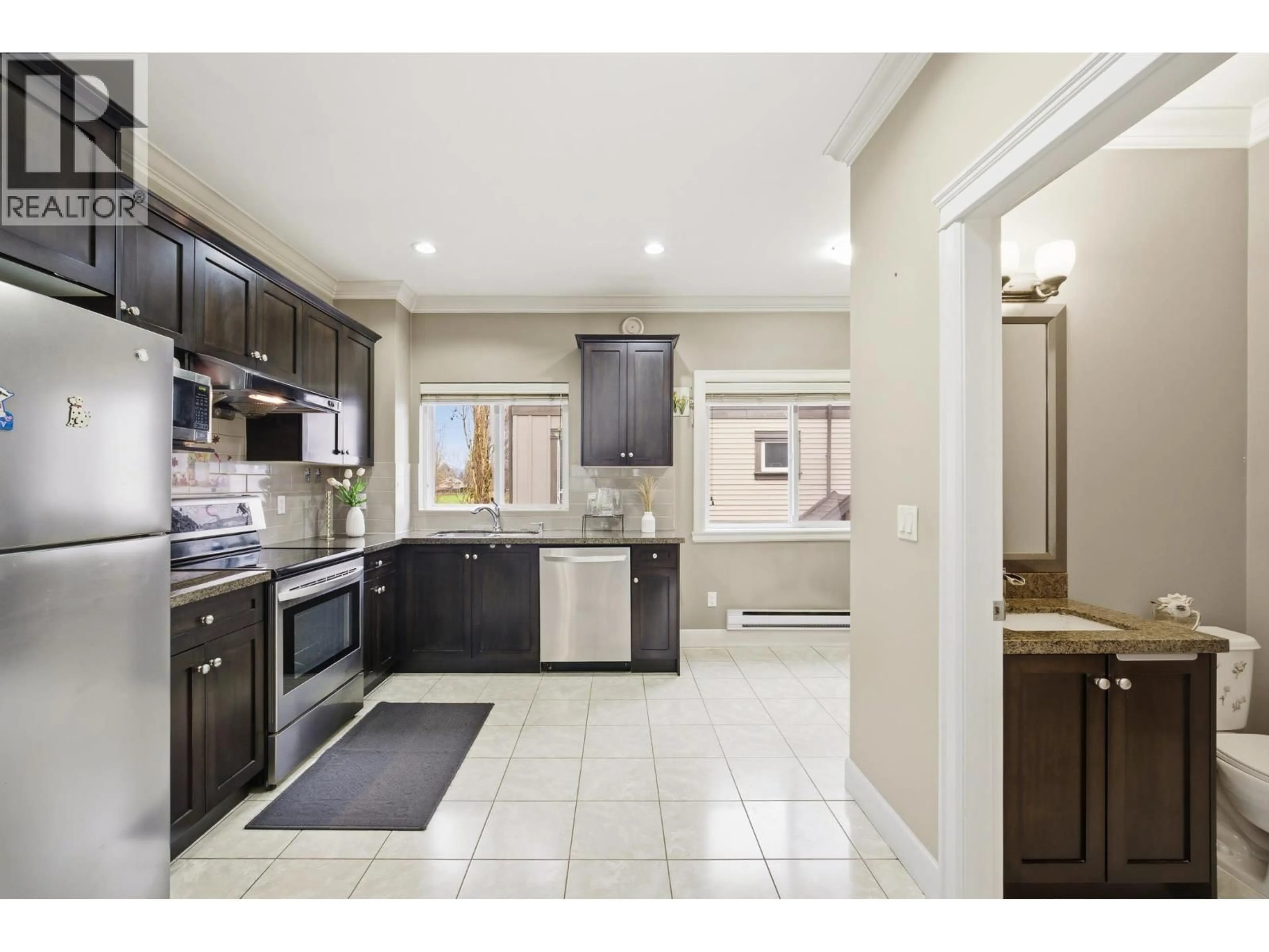Open concept kitchen, ceramic/tile floor for 11 - 10999 STEVESTON HIGHWAY, Richmond British Columbia V7A1N4
