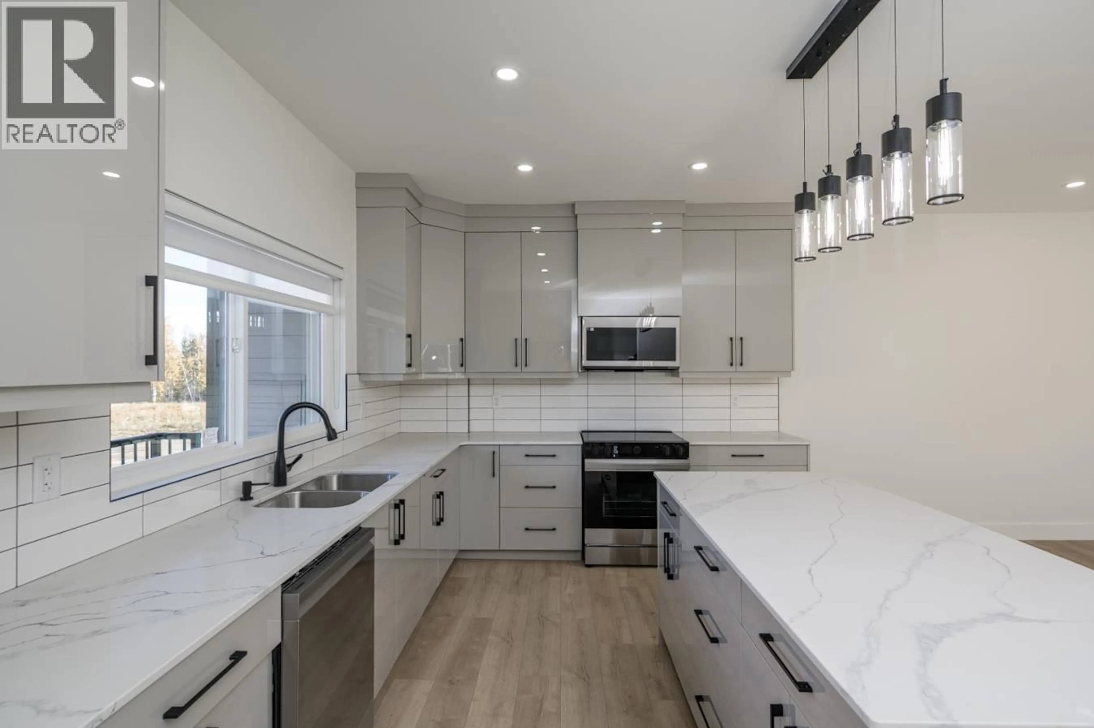 Open concept kitchen, ceramic/tile floor for #1202 - 2395 ROWE STREET, Prince George British Columbia V2N0K5