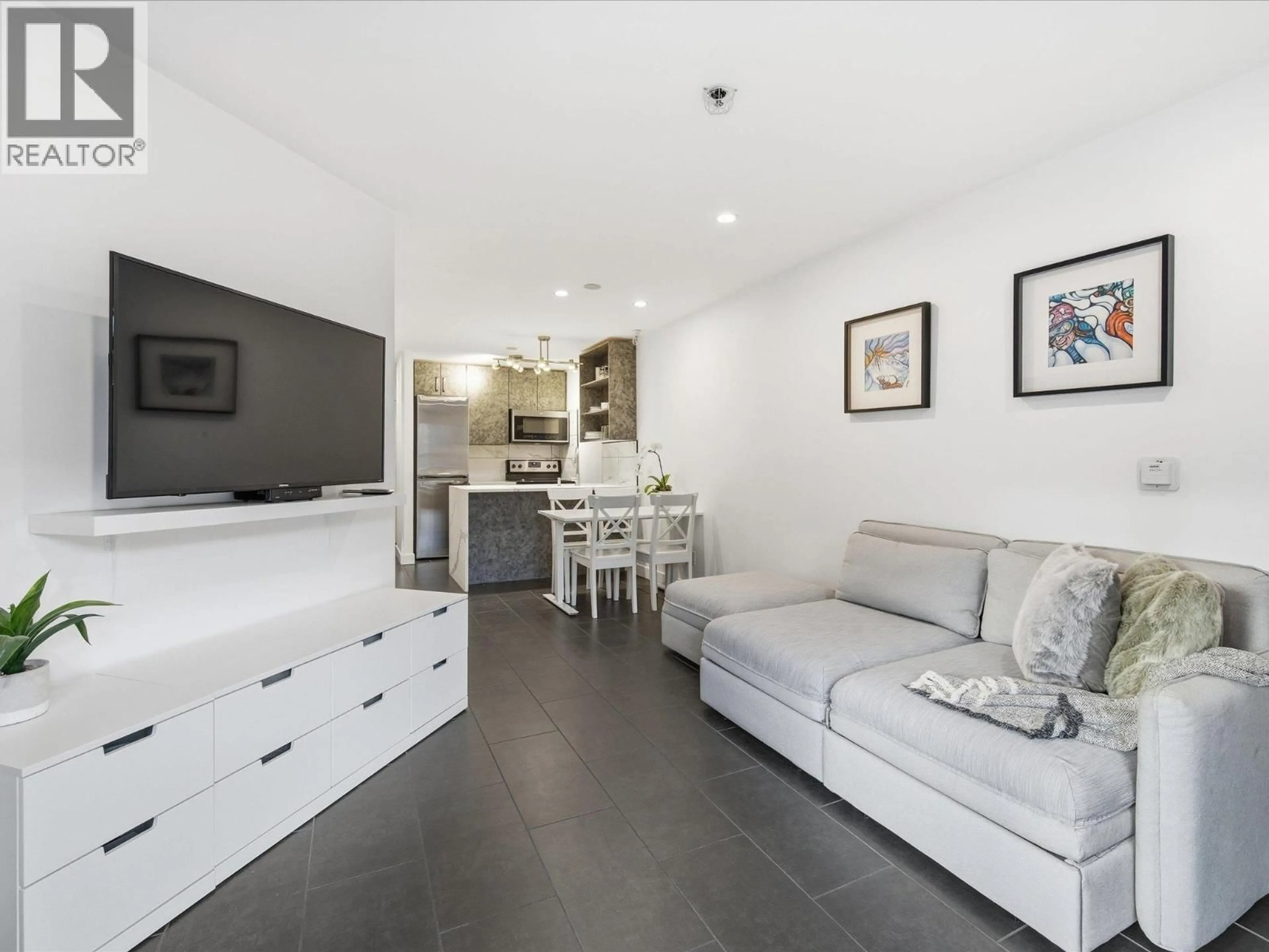 Living room with furniture, wood/laminate floor for 243 - 4350 LORIMER ROAD, Whistler British Columbia V8E1A5