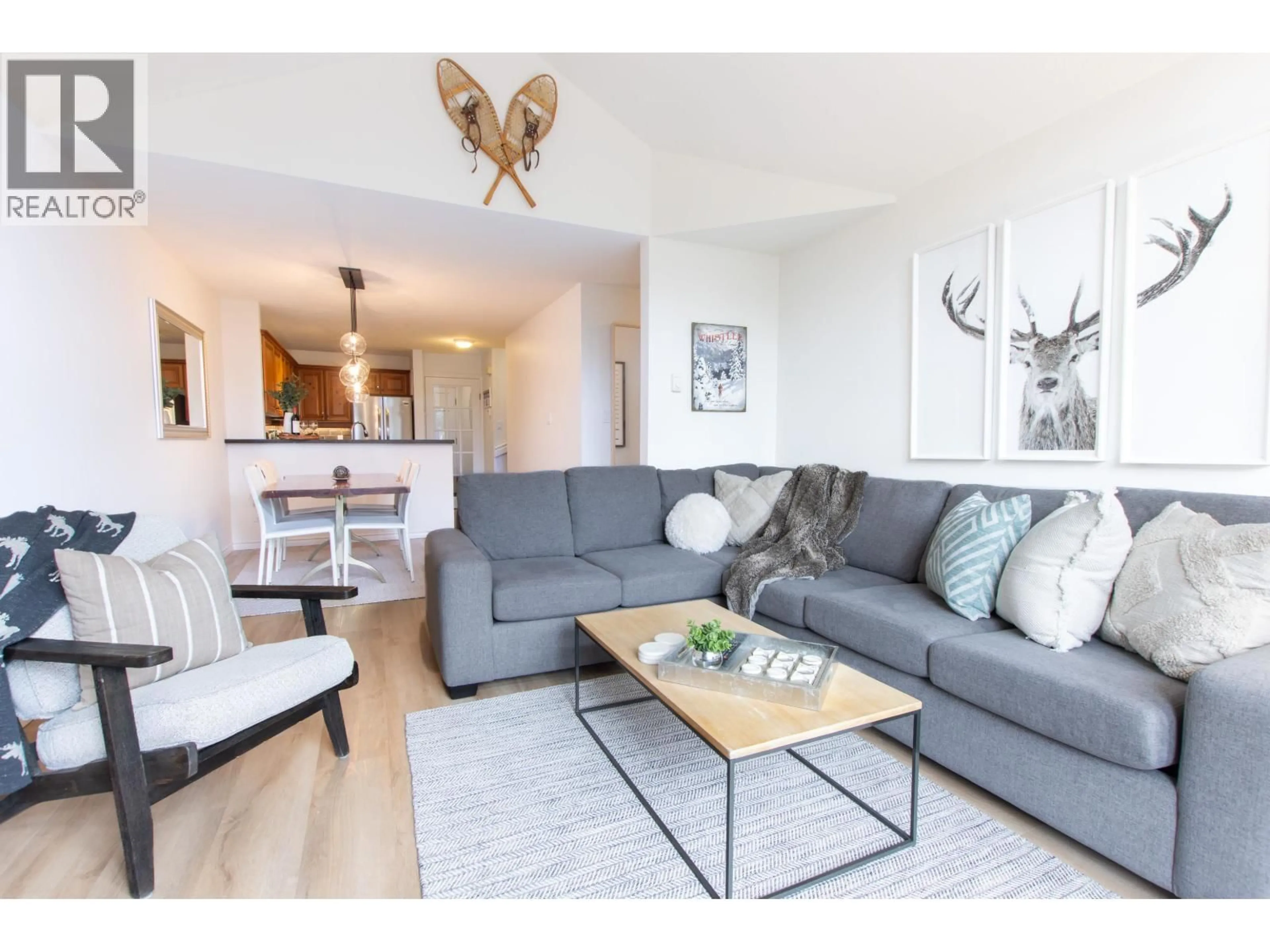 Living room with furniture, wood/laminate floor for 7 - 4890 PAINTED CLIFF ROAD, Whistler British Columbia V8E1C9