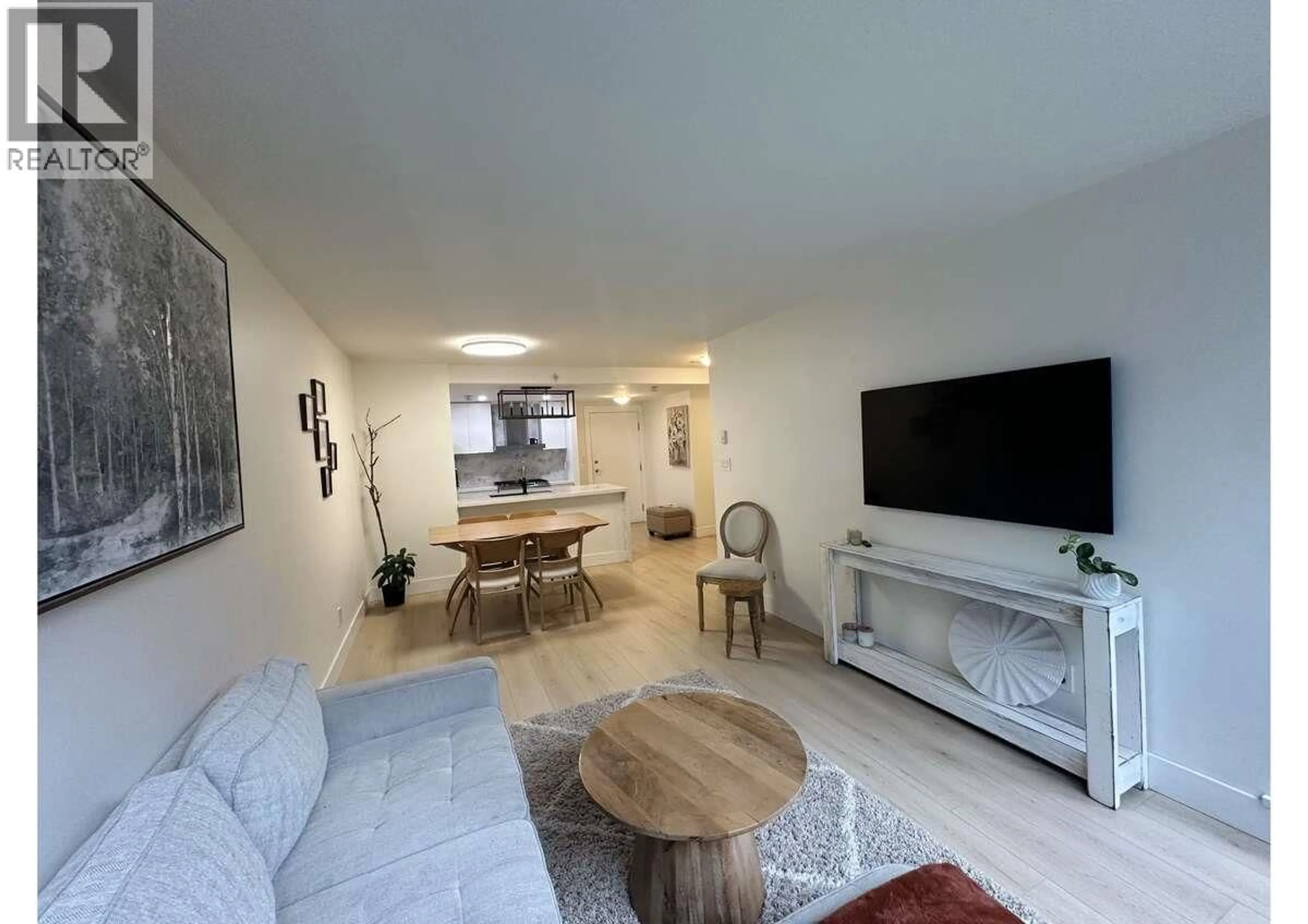 Living room with furniture, unknown for 202 - 1033 MARINASIDE CRESCENT, Vancouver British Columbia V6Z3A3