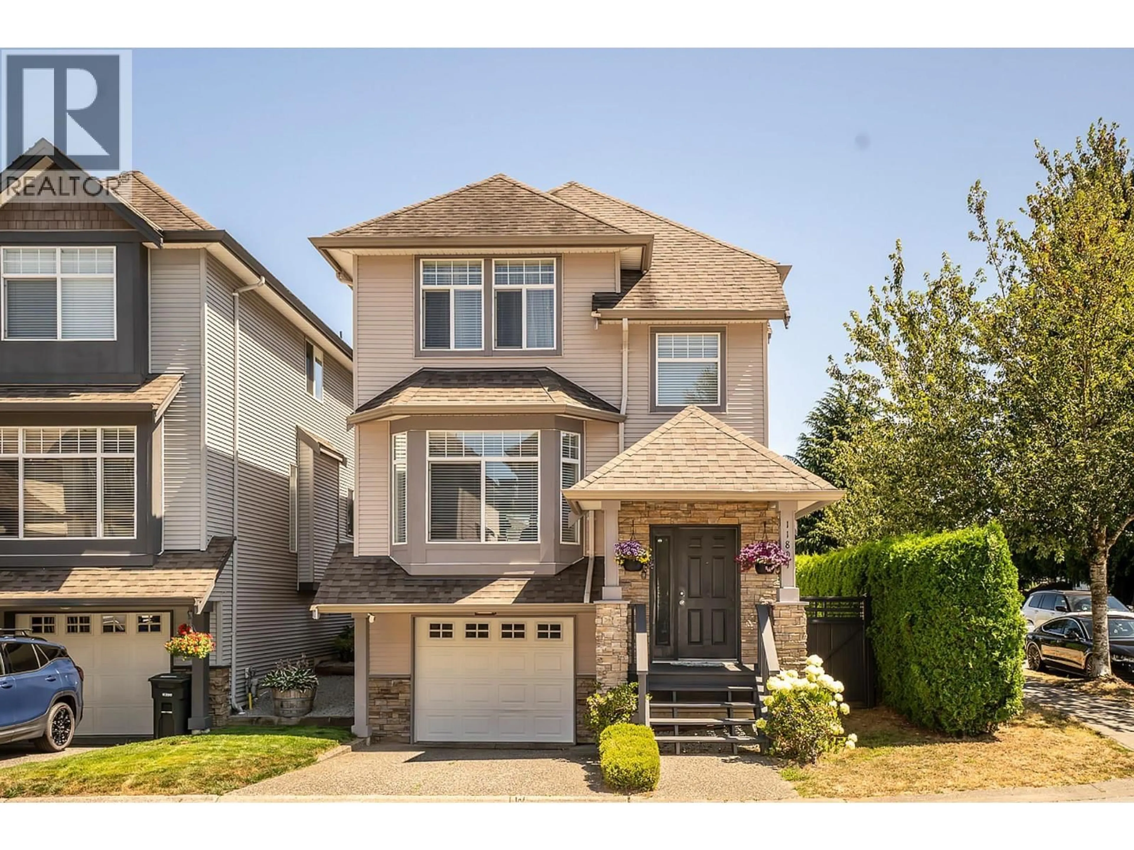 Home with vinyl exterior material, street for 11804 191A STREET, Pitt Meadows British Columbia V3Y0A4