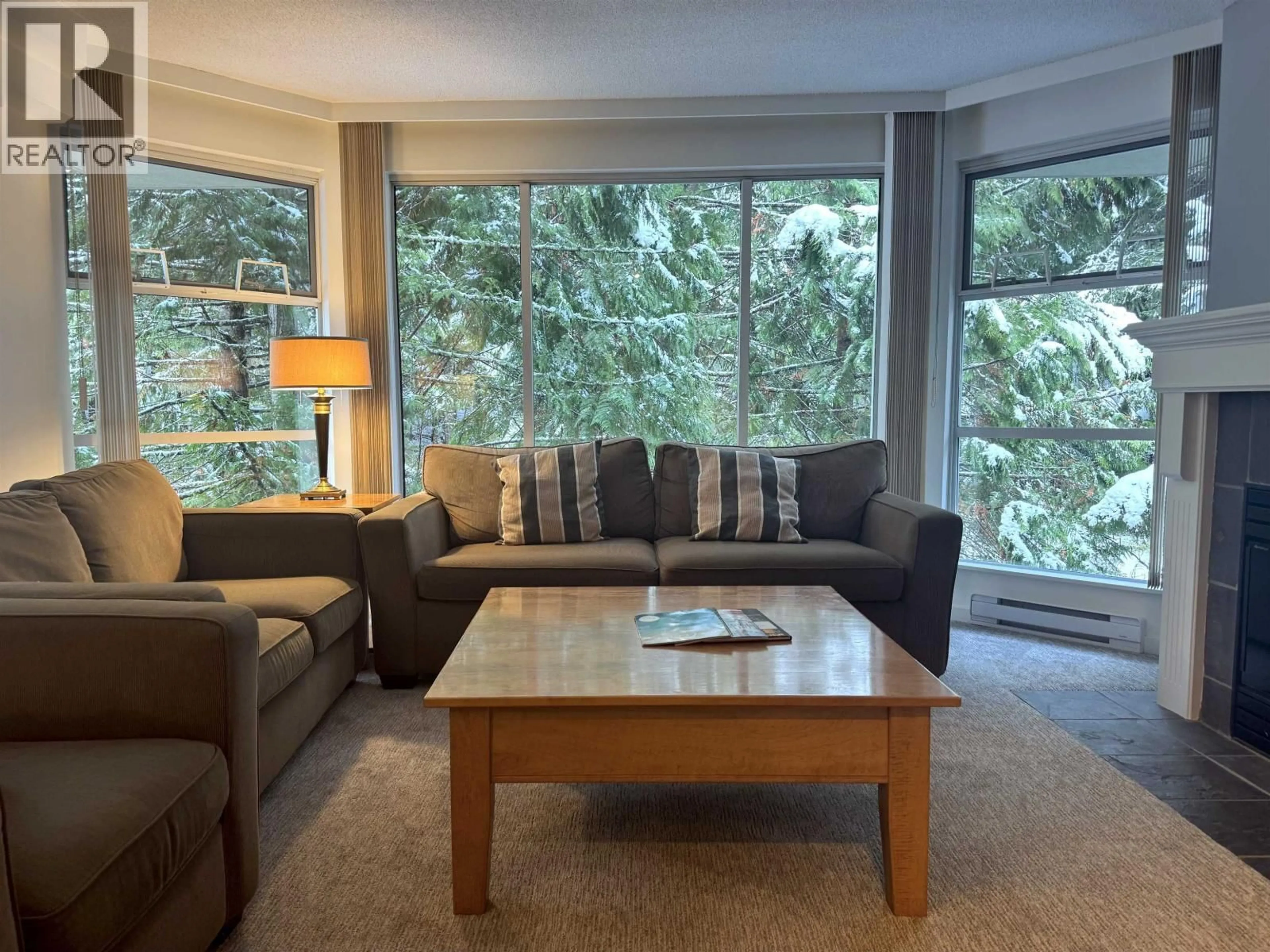 Living room with furniture, unknown for 420 w49 - 4910 SPEARHEAD PLACE, Whistler British Columbia V8E1G1