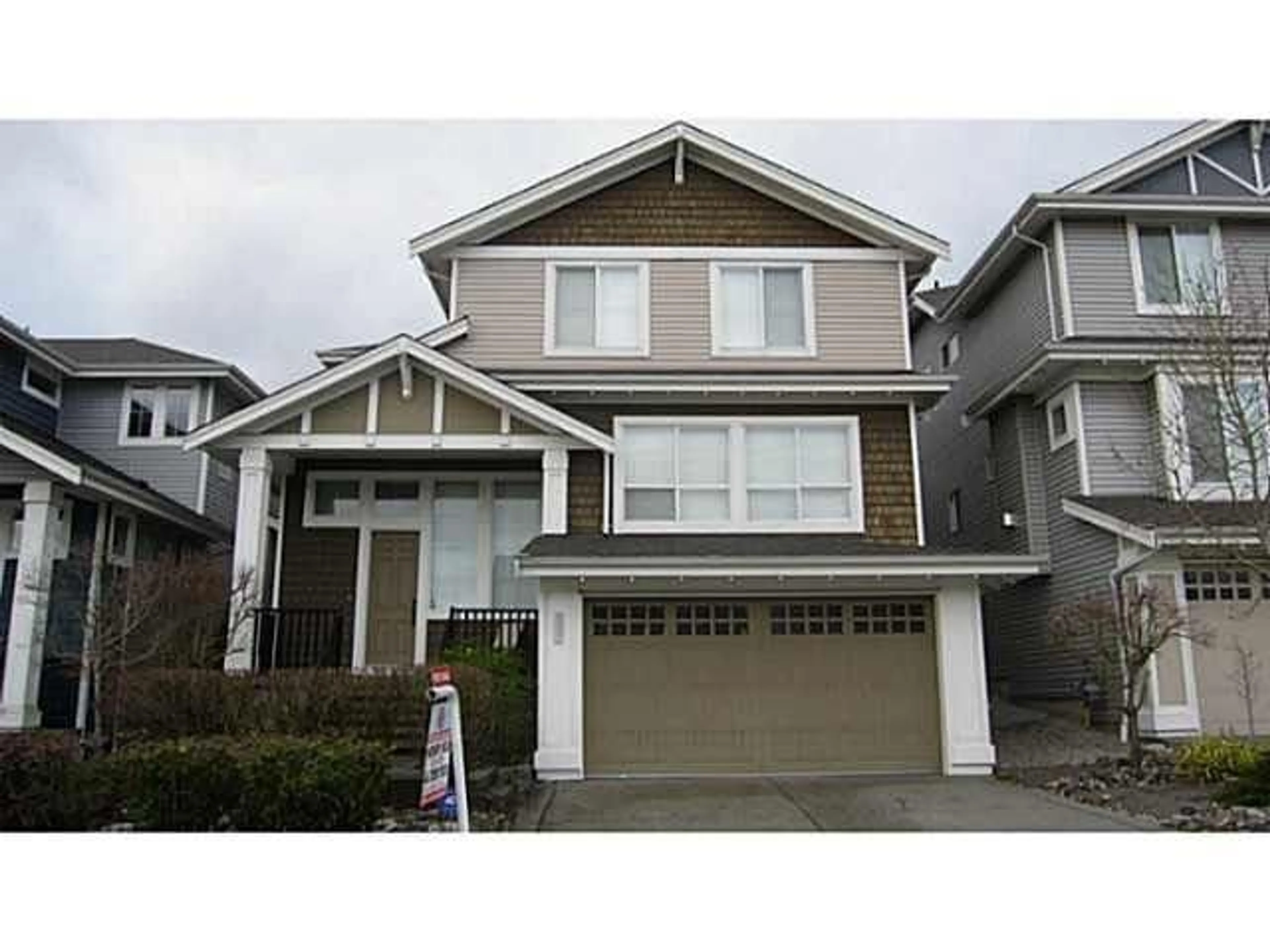 Home with vinyl exterior material, street for 20209 68A AVENUE, Langley British Columbia V2Y0B7