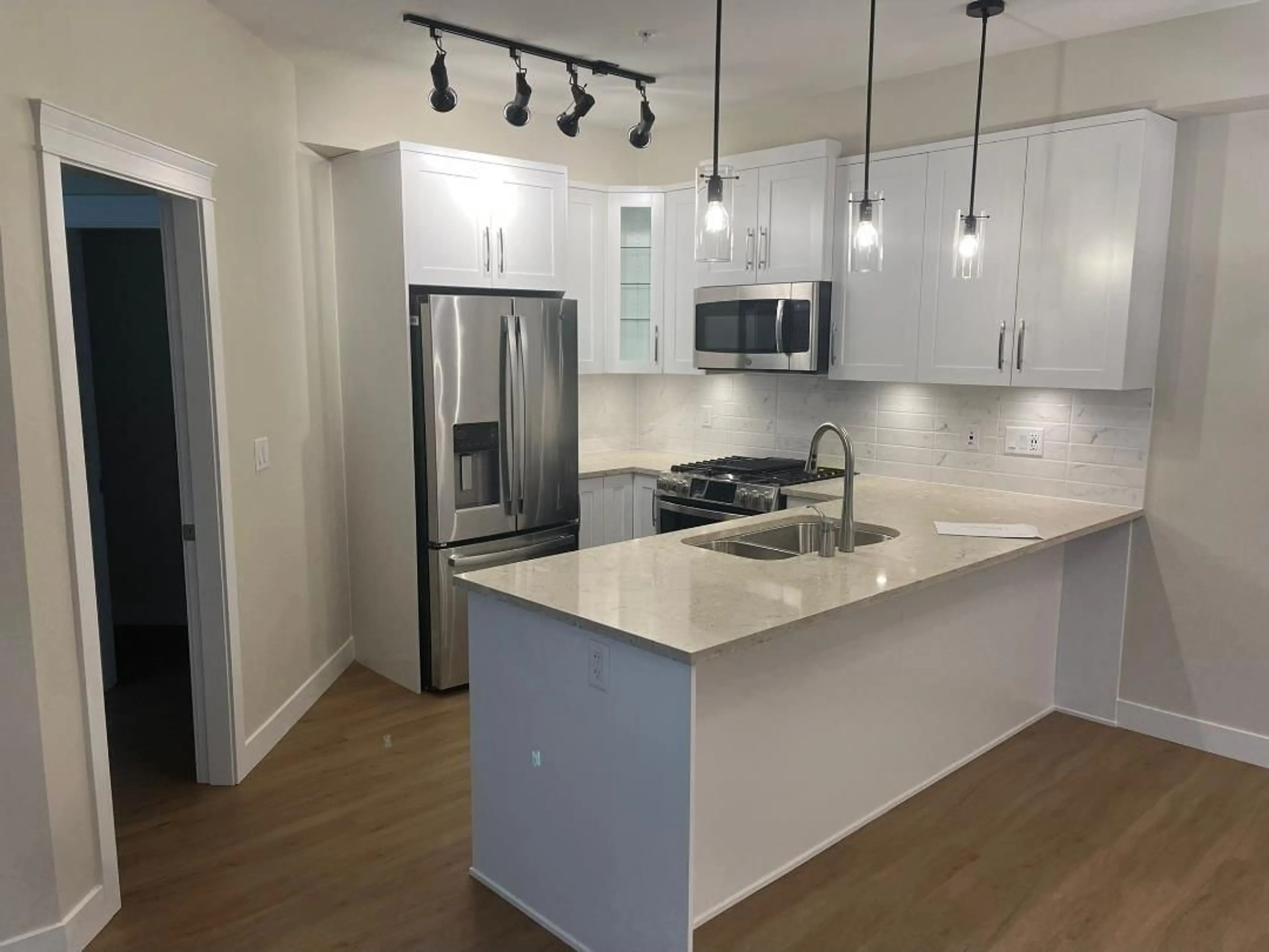 Open concept kitchen, unknown for 203 - 11077 RAVINE ROAD, Surrey British Columbia V3T3X5