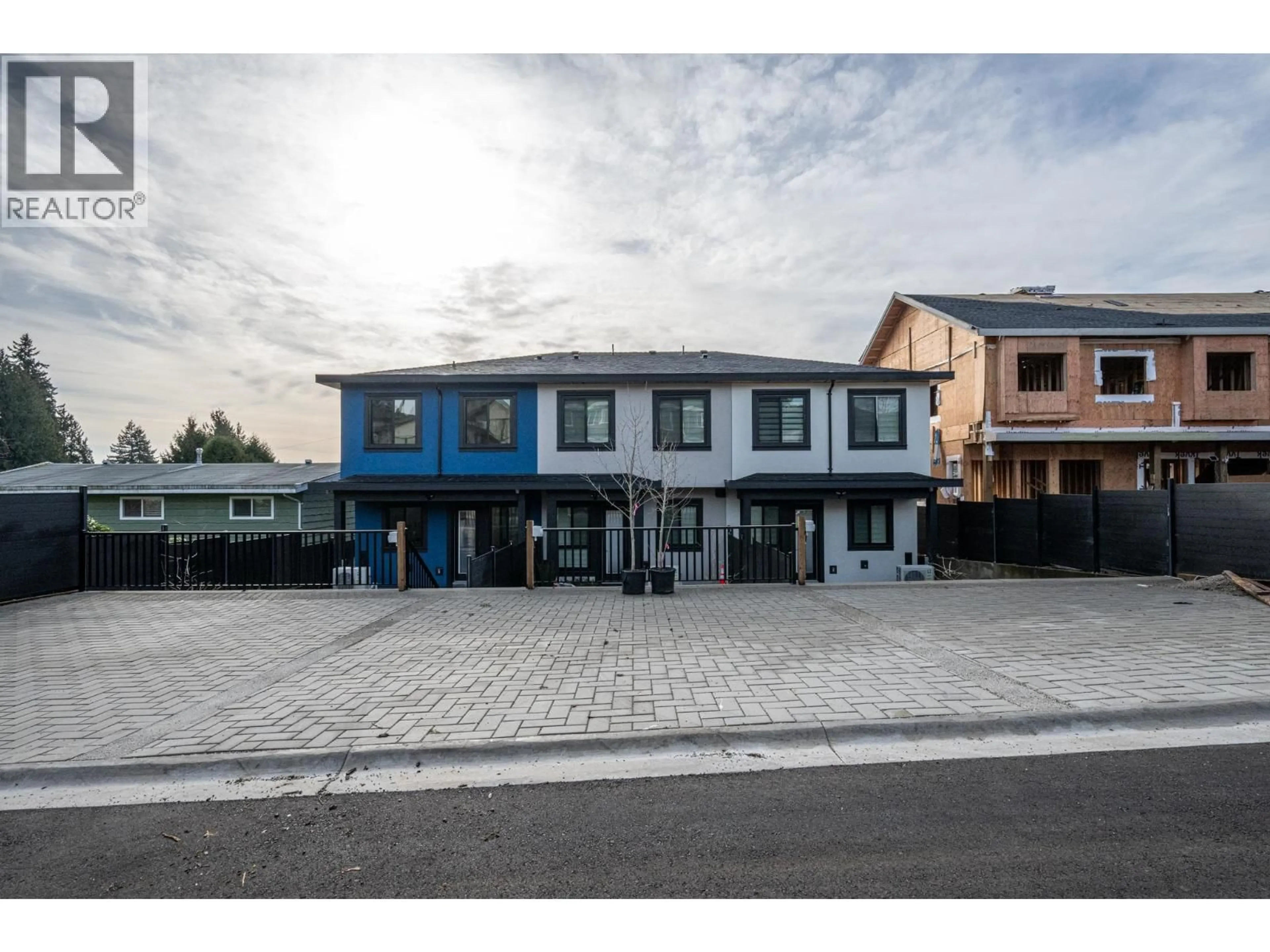 A pic from outside/outdoor area/front of a property/back of a property/a pic from drone, street for 102 - 1149 DANSEY AVENUE, Coquitlam British Columbia V3K3H5