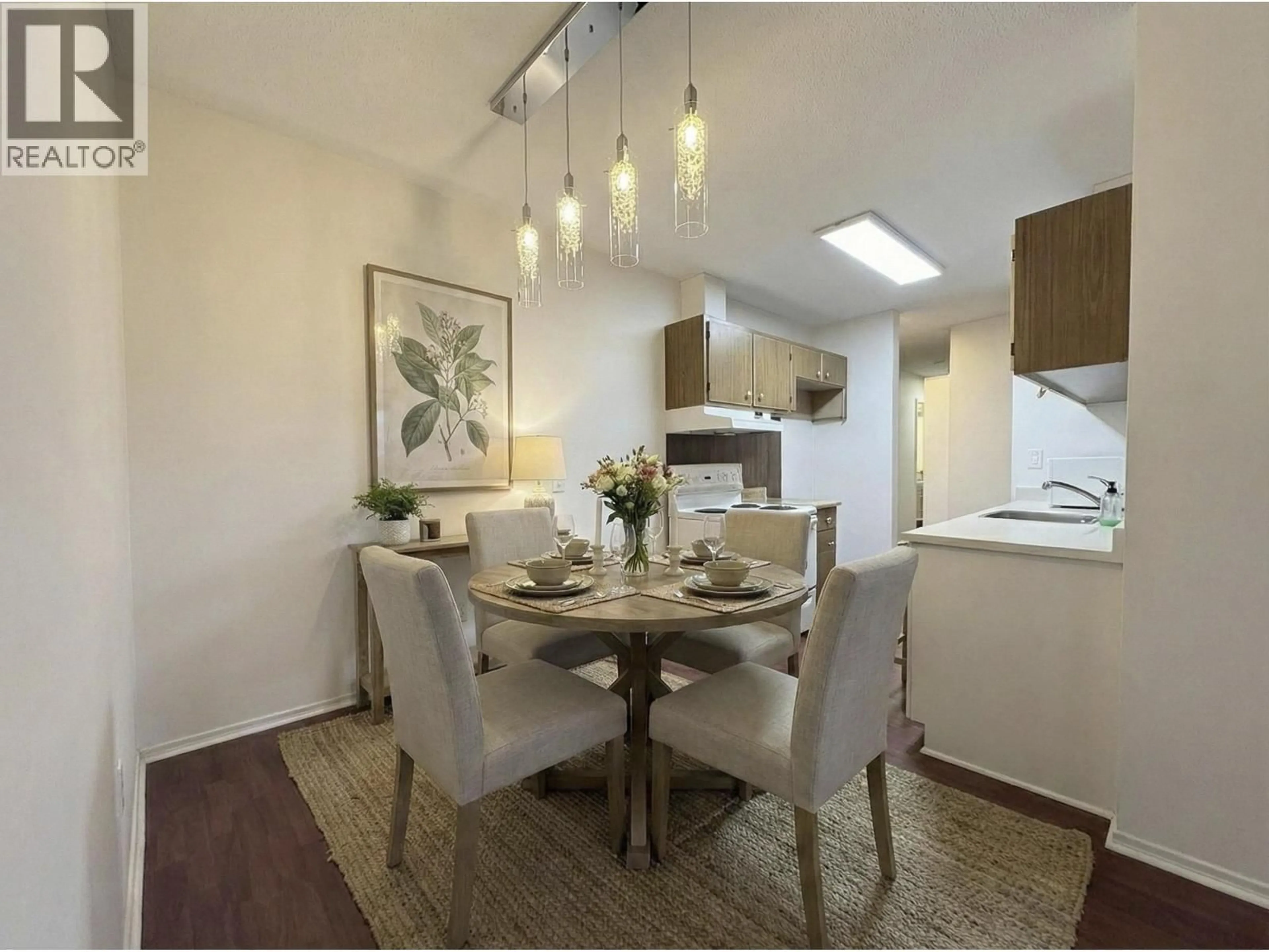 Dining room, wood/laminate floor for 302 - 8020 RYAN ROAD, Richmond British Columbia V7A2E5