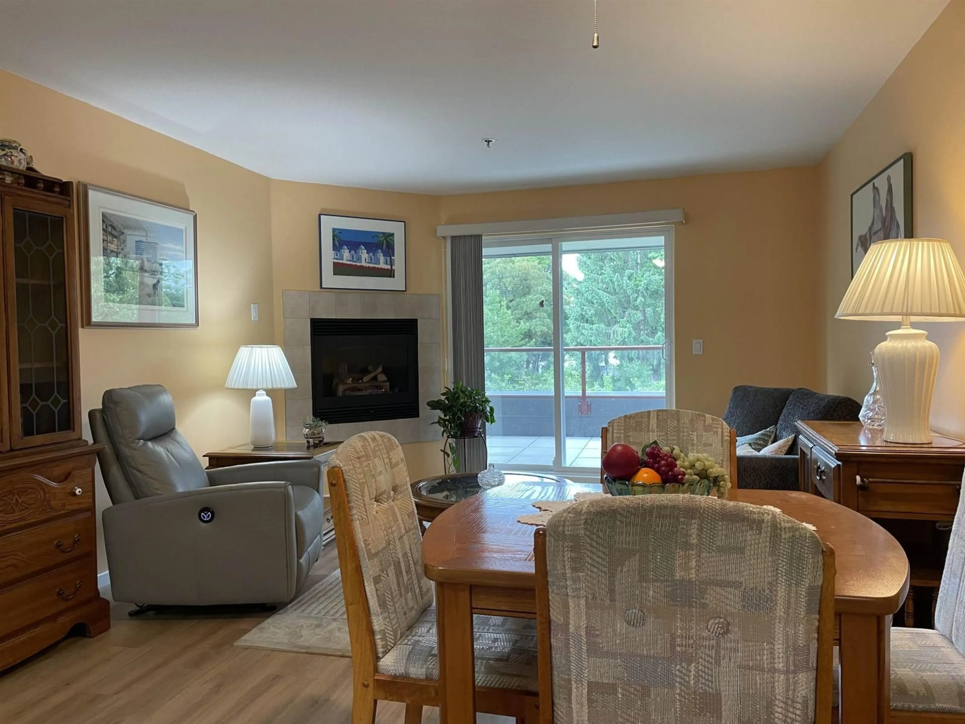 Living room with furniture, wood/laminate floor for 204 - 8980 MARY STREET, Chilliwack British Columbia V2P4J3