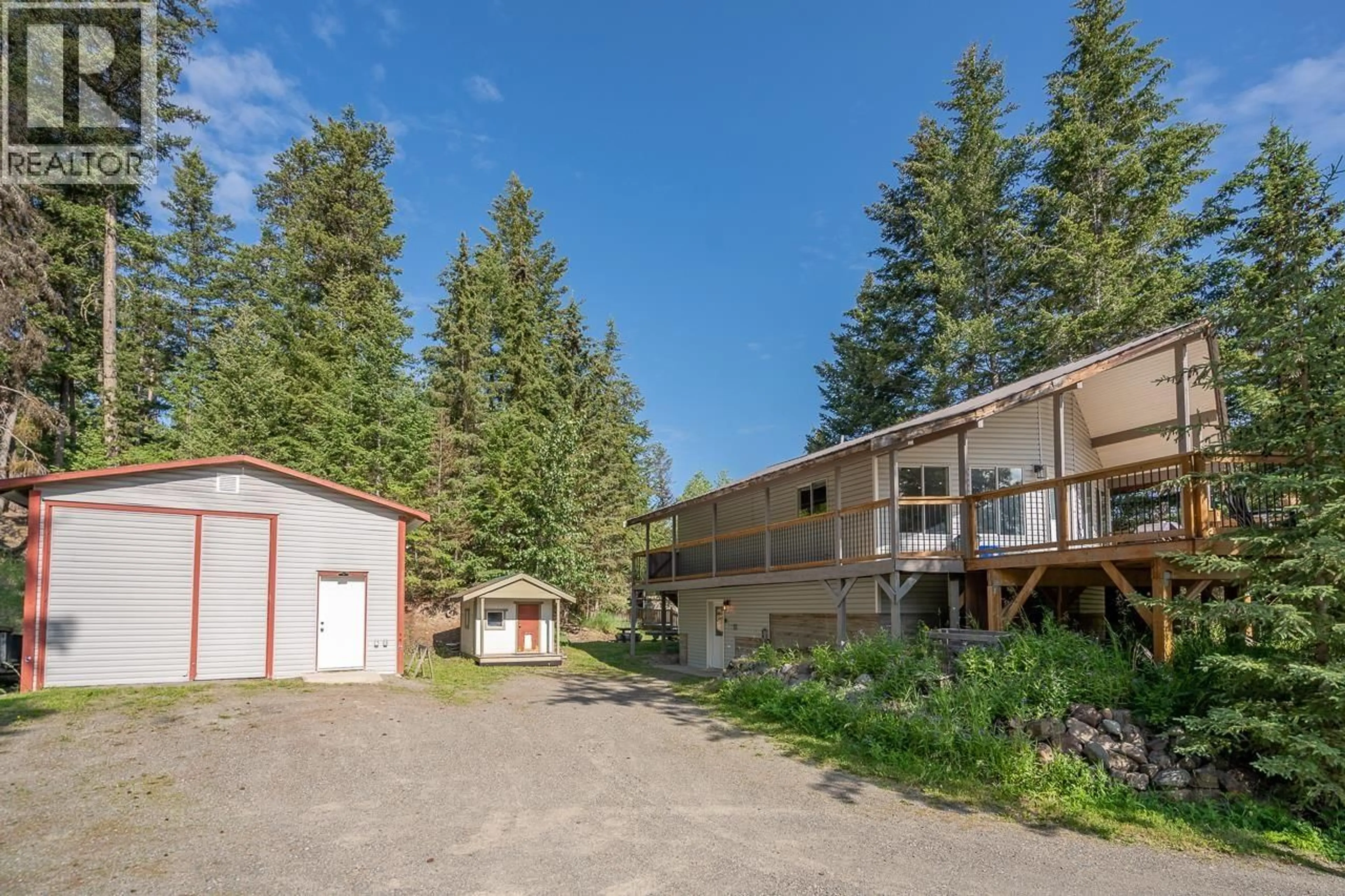 A pic from outside/outdoor area/front of a property/back of a property/a pic from drone, unknown for 5324 KALLUM DRIVE, 108 Mile Ranch British Columbia V0K2Z0