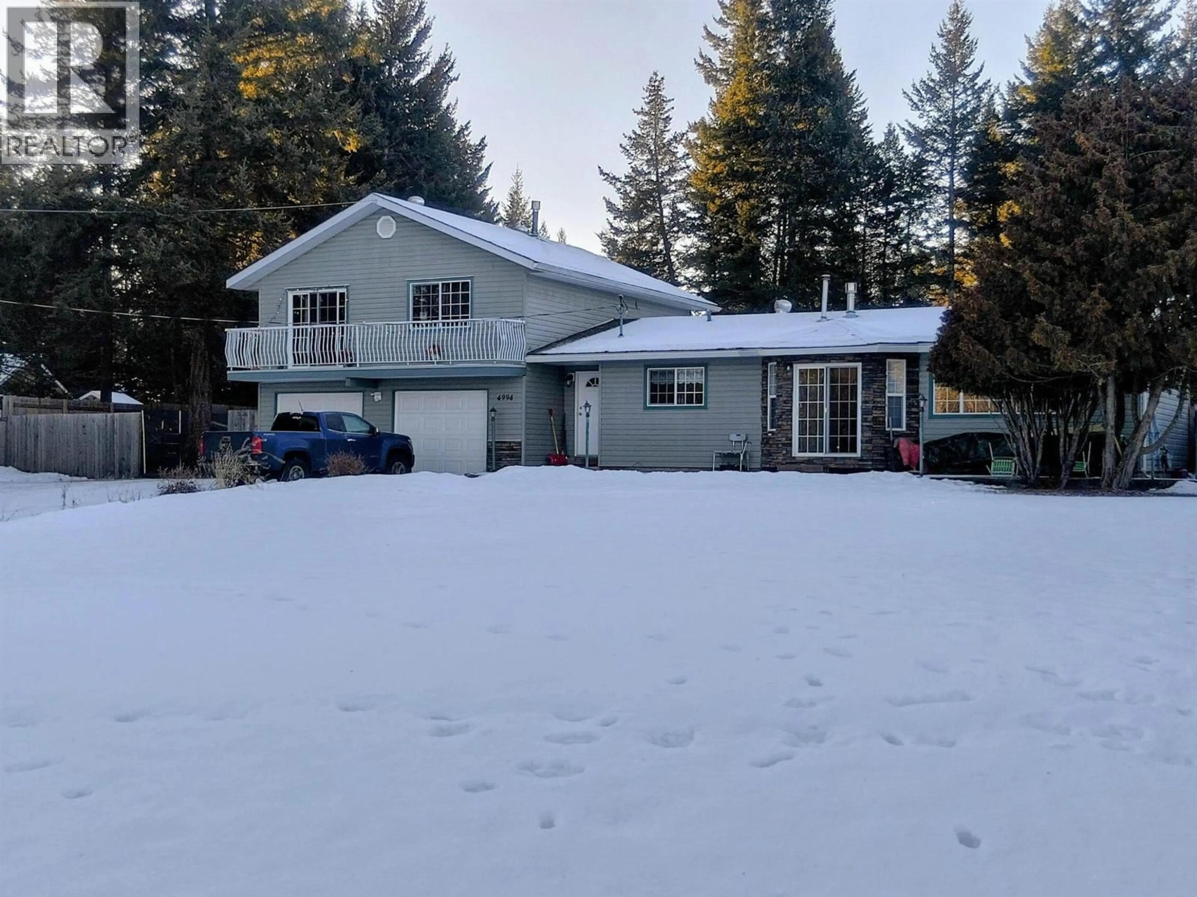 A pic from outside/outdoor area/front of a property/back of a property/a pic from drone, unknown for 4994 DONSLEEQUA ROAD, 108 Mile Ranch British Columbia V0K2Z0