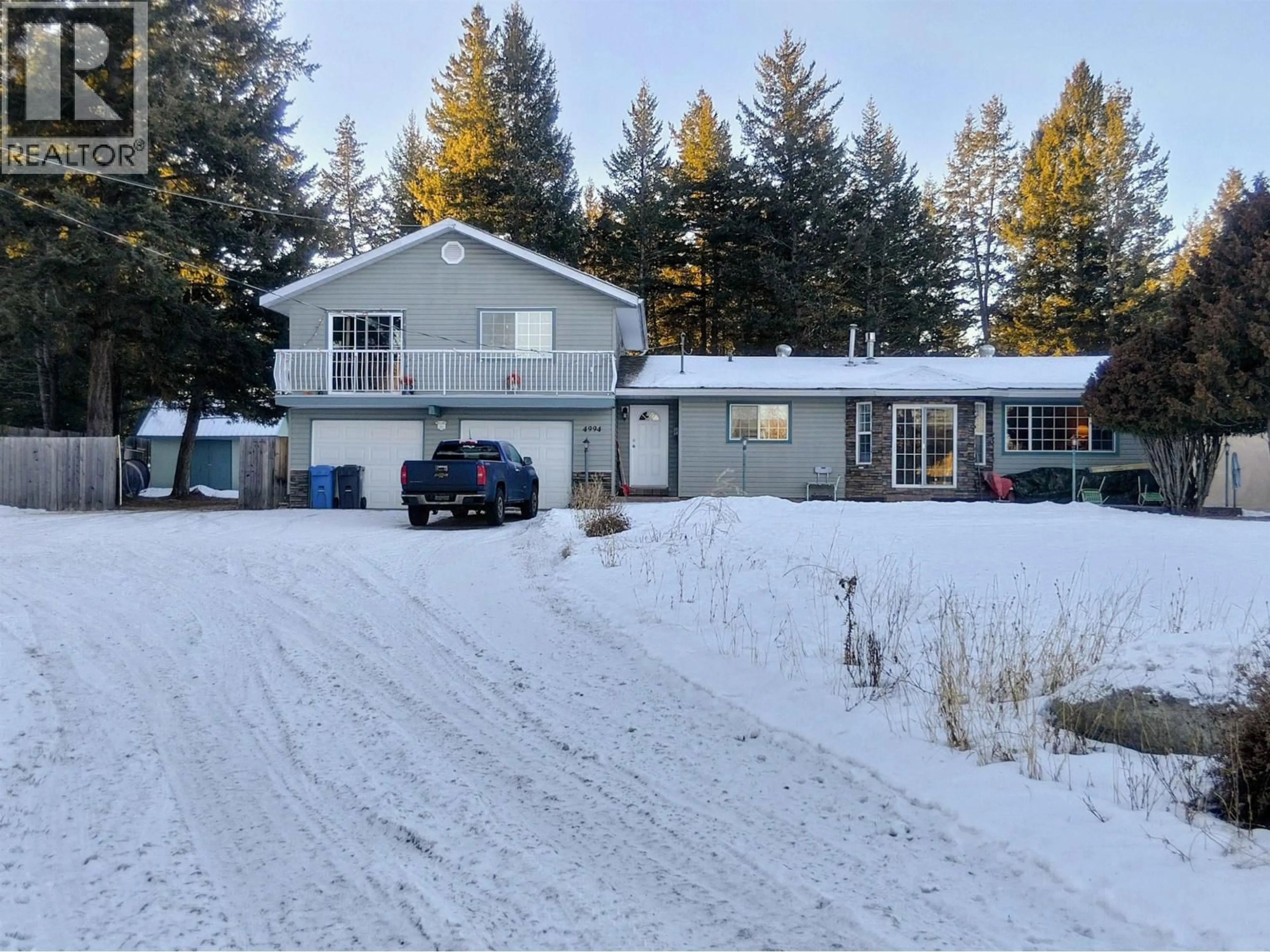 A pic from outside/outdoor area/front of a property/back of a property/a pic from drone, street for 4994 DONSLEEQUA ROAD, 108 Mile Ranch British Columbia V0K2Z0