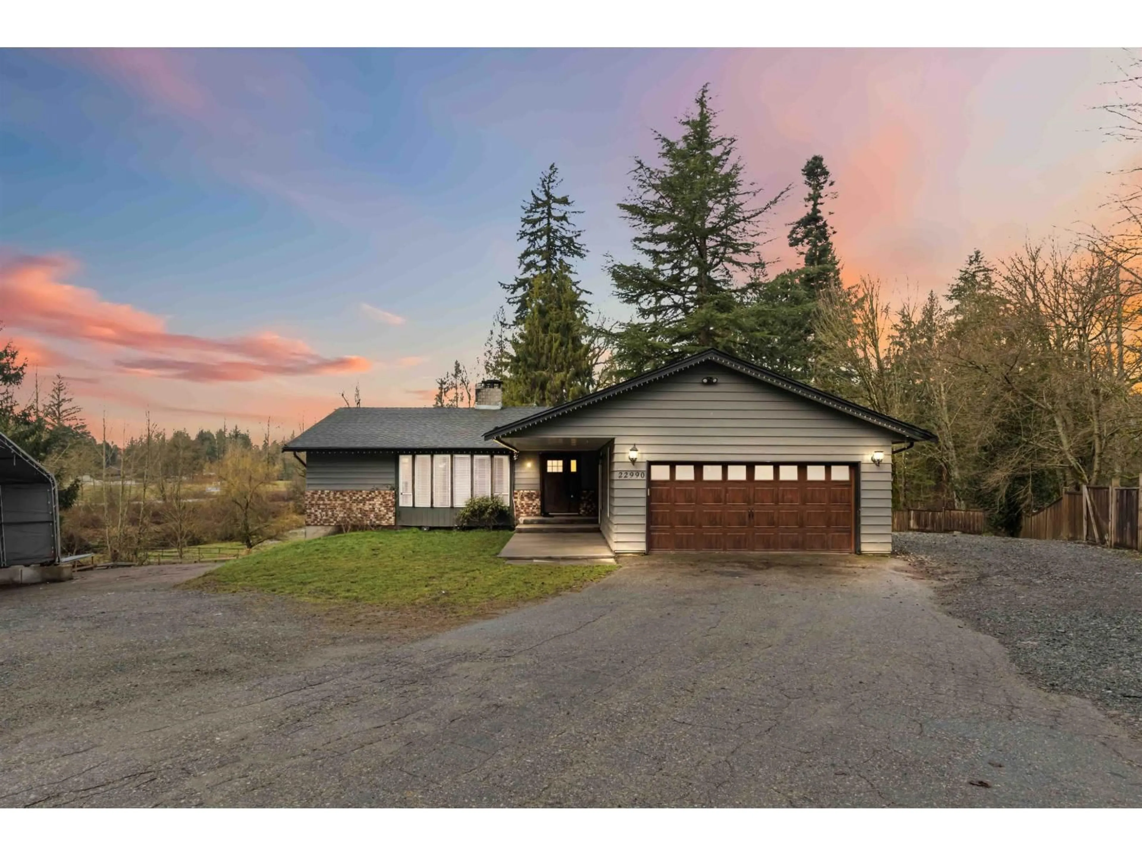 A pic from outside/outdoor area/front of a property/back of a property/a pic from drone, street for 22990 70A AVENUE, Langley British Columbia V2Y2J9