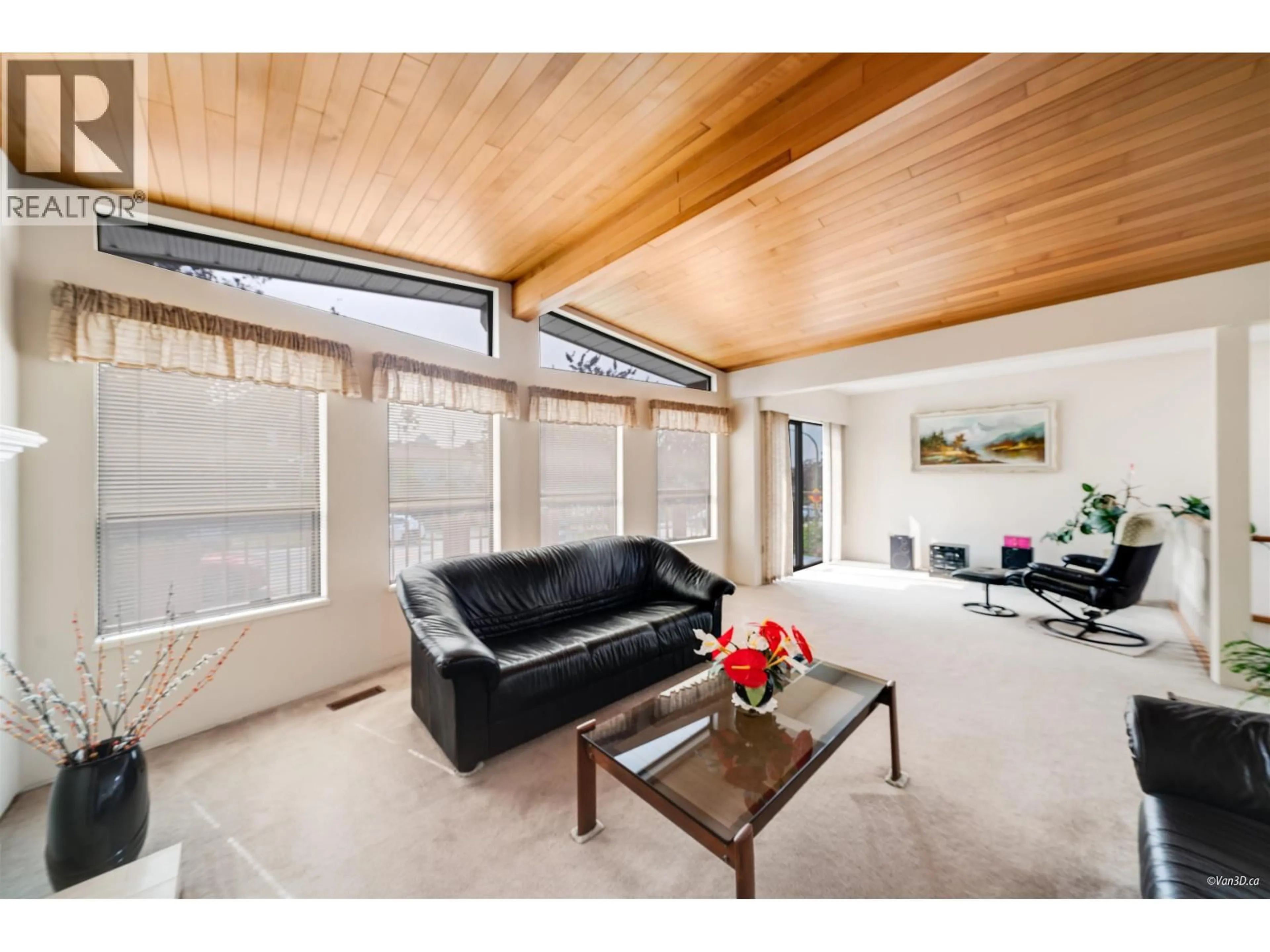 Living room with furniture, wood/laminate floor for 4737 PENDER STREET, Burnaby British Columbia V5C2N4