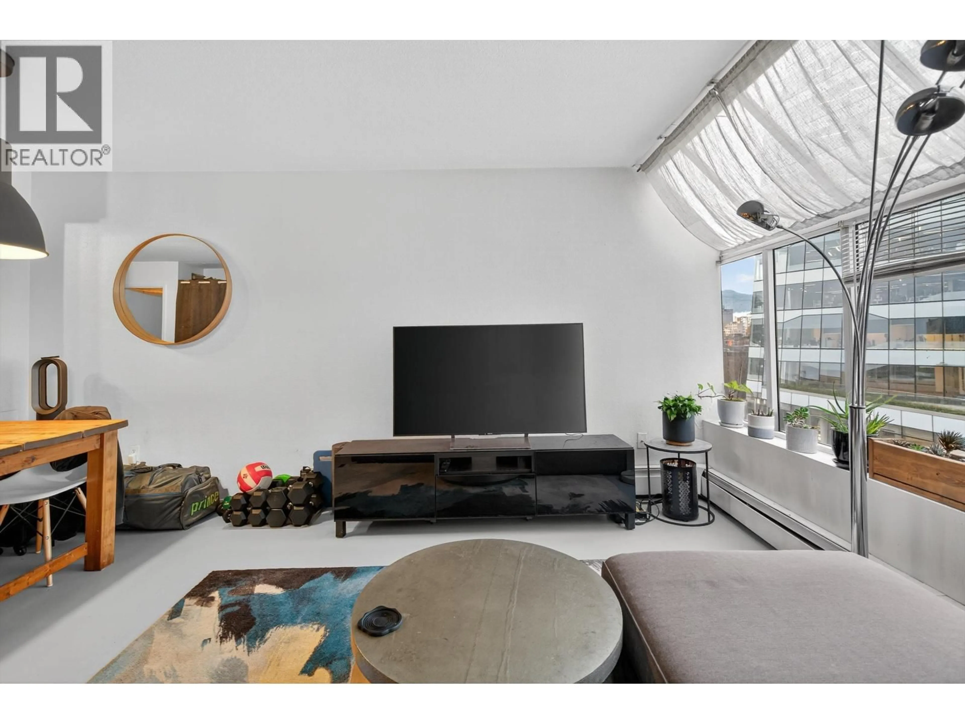 Living room with furniture, unknown for 902 - 950 DRAKE STREET, Vancouver British Columbia V6Z2B9