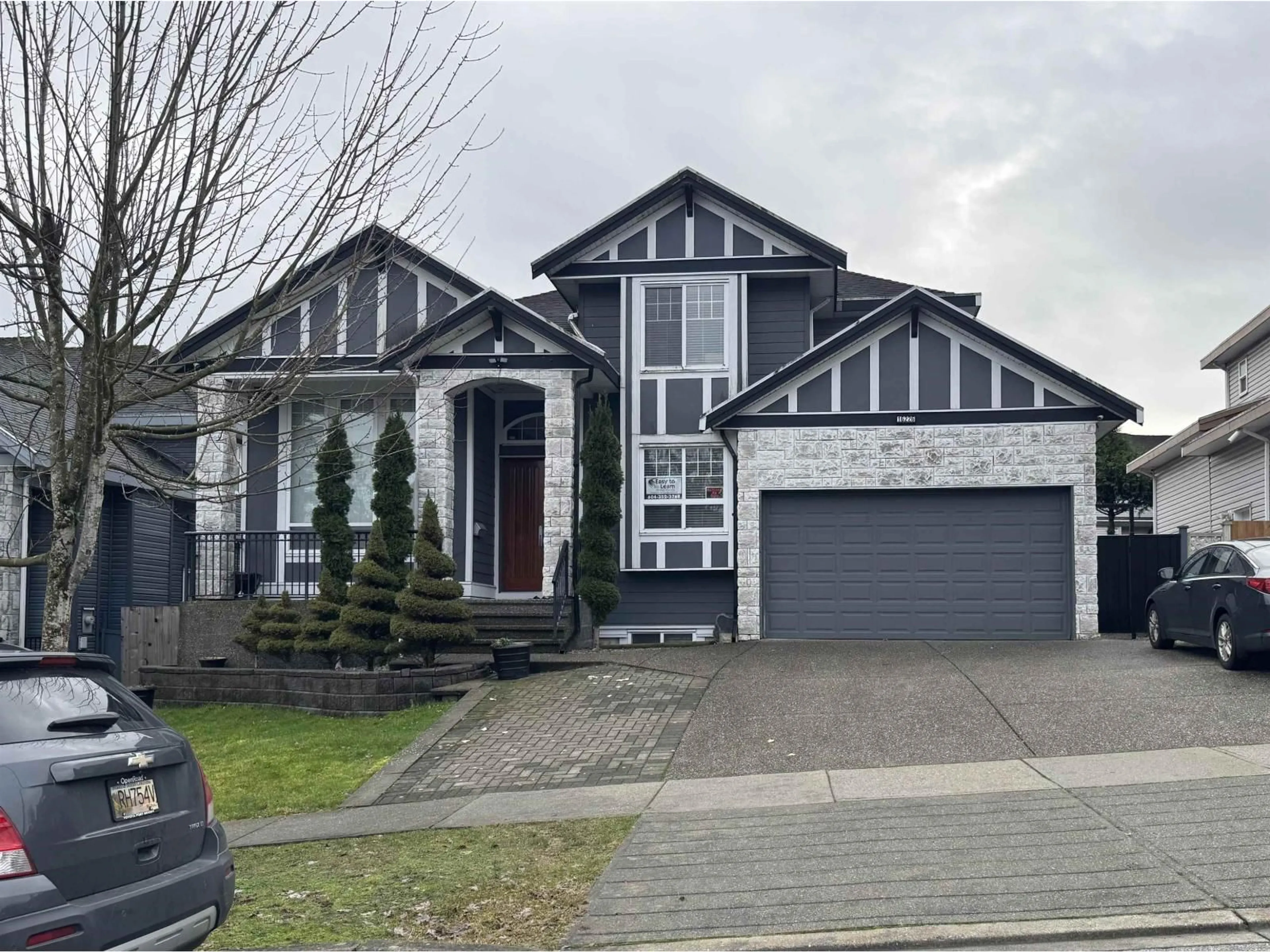 Home with vinyl exterior material, street for 16226 96B AVENUE, Surrey British Columbia V4N5X2