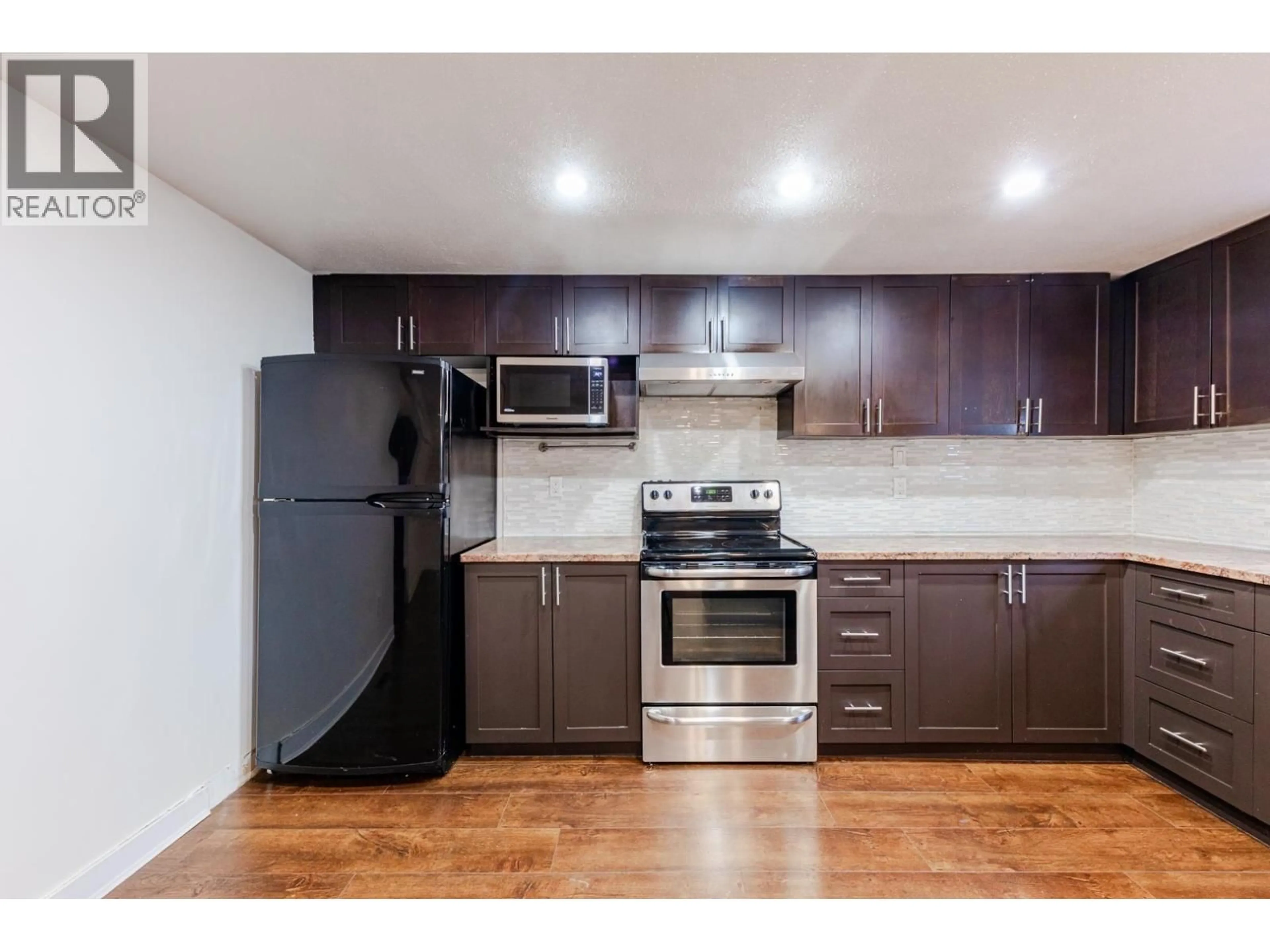 Standard kitchen, wood/laminate floor for 8008 ASH STREET, Richmond British Columbia V6Y3H8